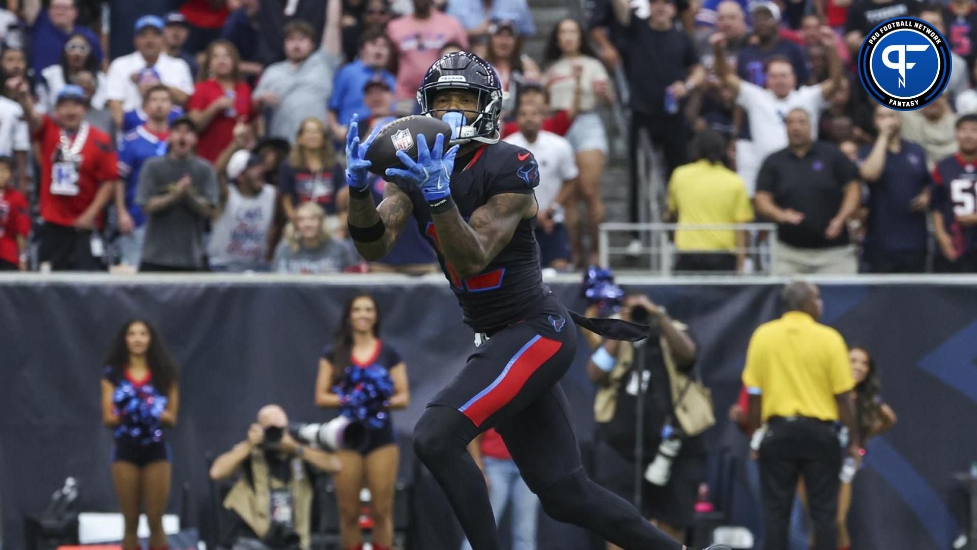 Houston Texans wide receiver Nico Collins (12) makes a reception for a touchdown during the first quarter against the Buffalo Bills at NRG Stadium.