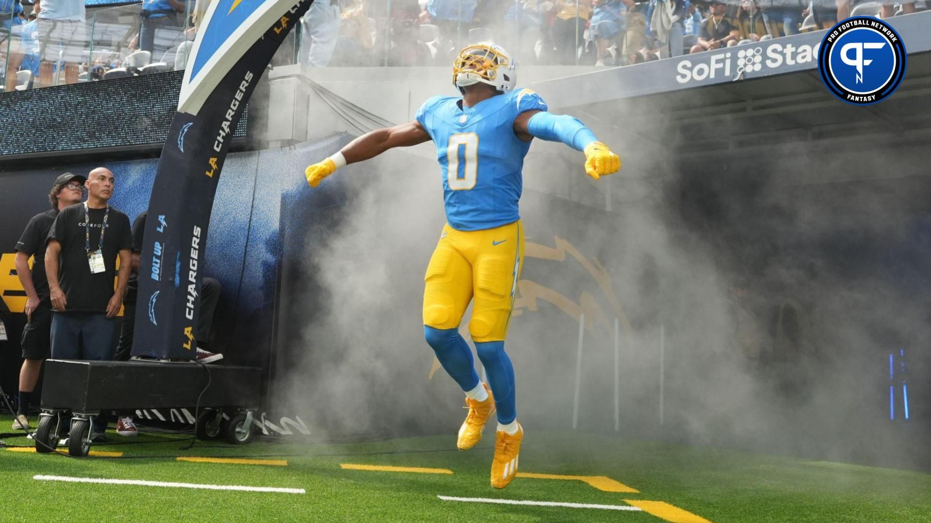 Los Angeles Chargers linebacker Daiyan Henley (0) enters the field before the game against the Kansas City Chiefs at SoFi Stadium.