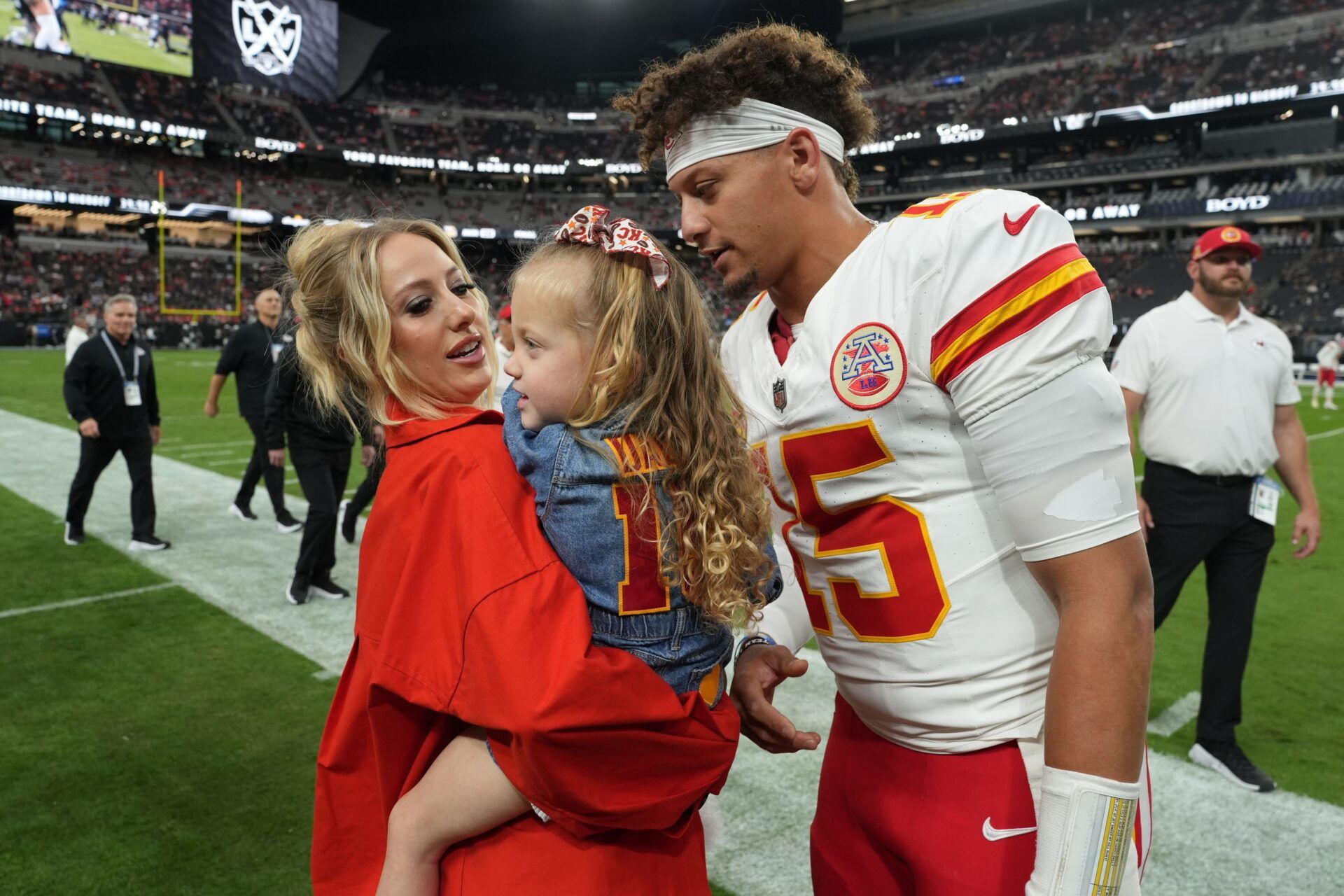 Kansas City Chiefs quarterback Patrick Mahomes (15) interacts with wife Brittany Mahomes and daughter Sterling Mahomes during the game against the Las Vegas Raiders at Allegiant Stadium.