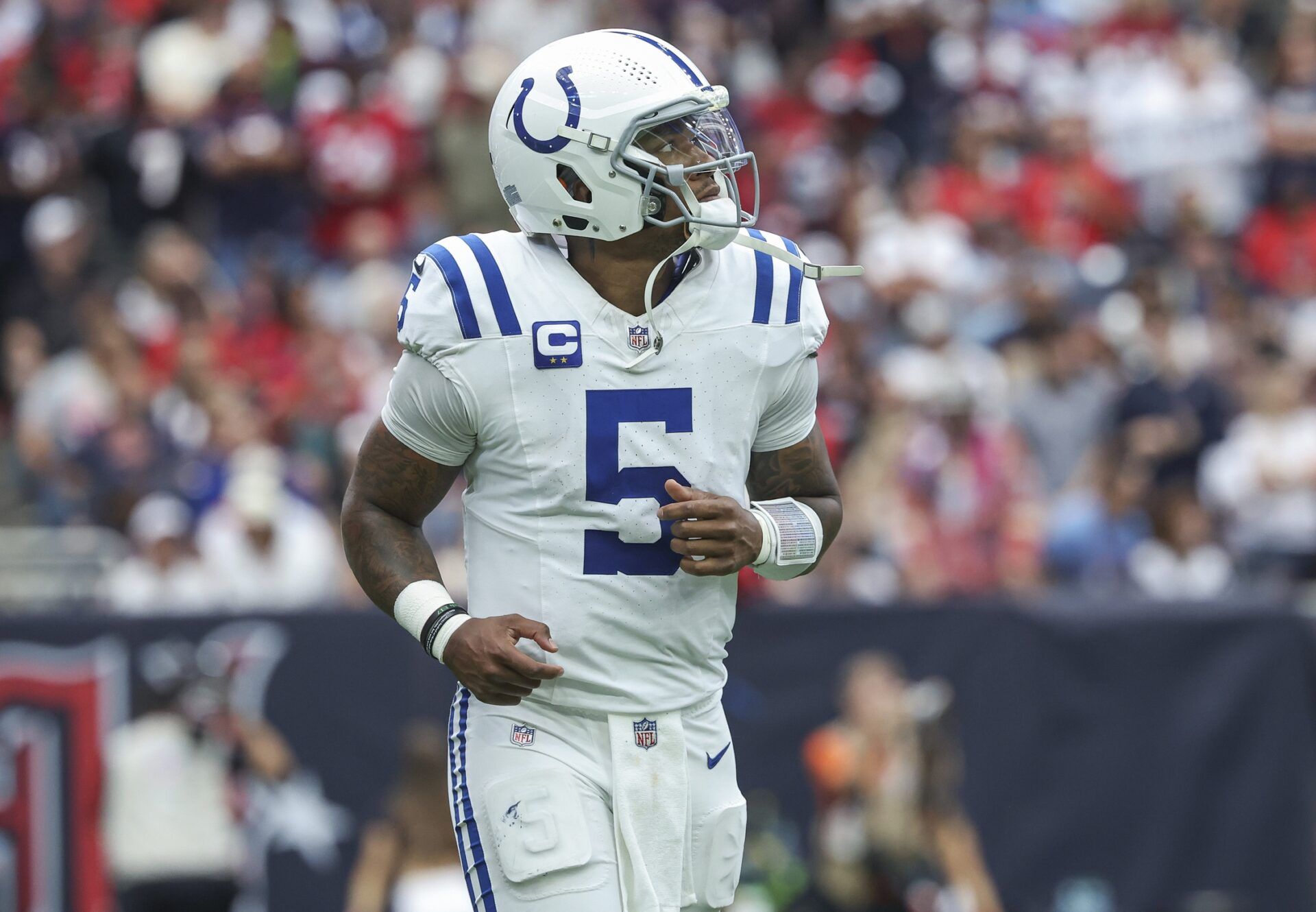 Indianapolis Colts quarterback Anthony Richardson (5) jogs off the field after a play during the second quarter against the Houston Texans at NRG Stadium.