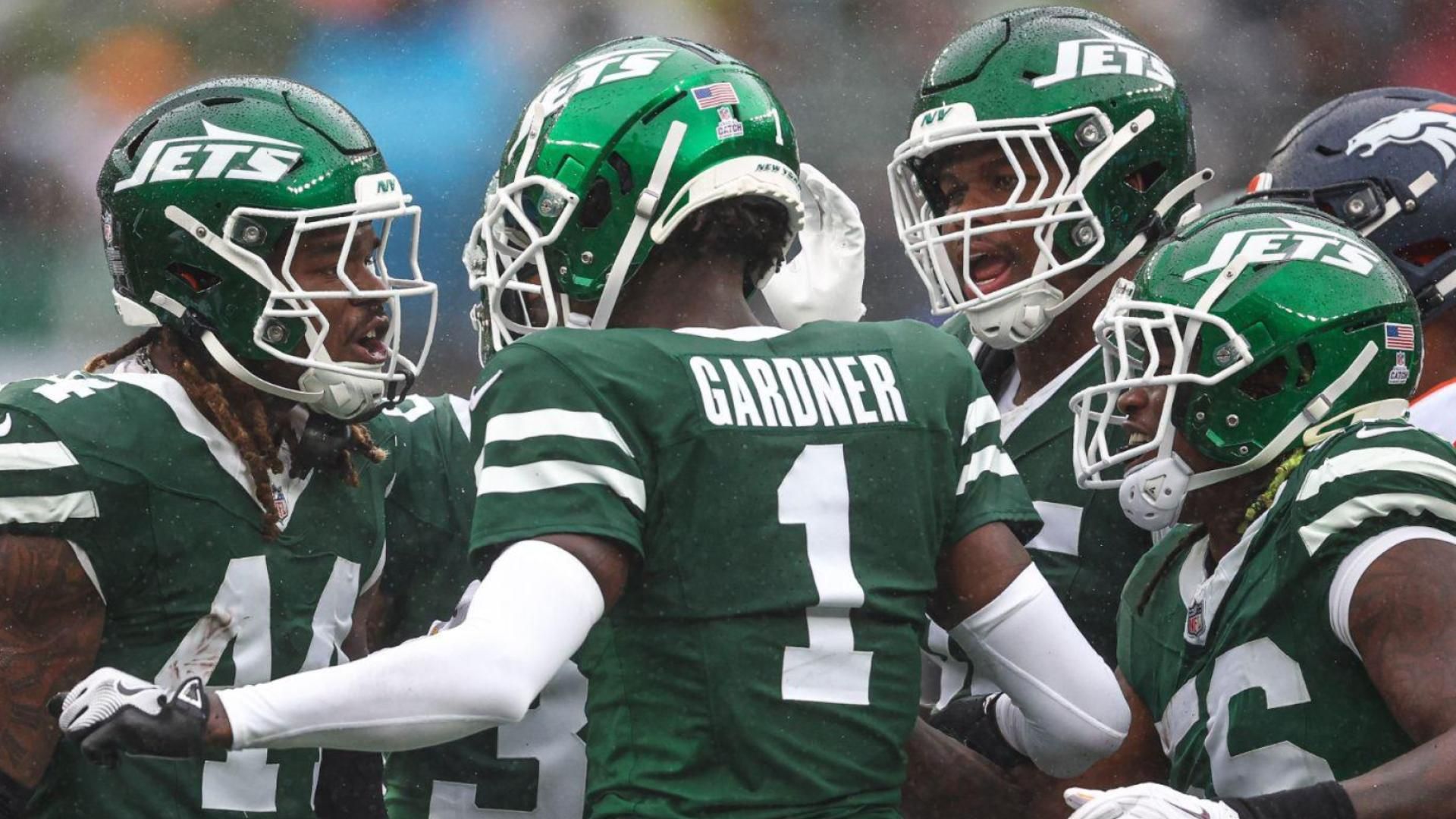 New York Jets linebacker Jamien Sherwood (44) and cornerback Sauce Gardner (1) celebrate a defensive stop during the first half against the Denver Broncos at MetLife Stadium.