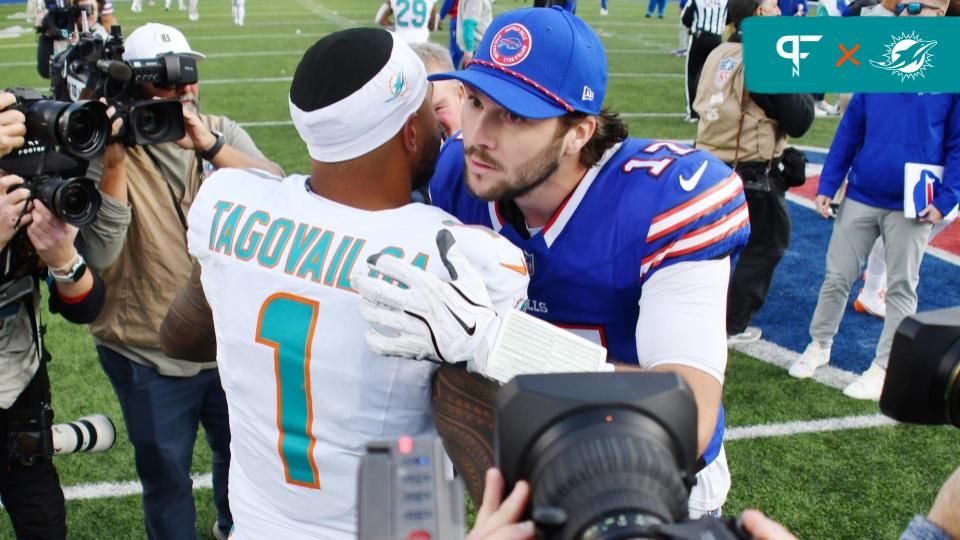 Buffalo Bills quarterback Josh Allen (17) greets Miami Dolphins quarterback Tua Tagovailoa (1) after a game at Highmark Stadium.