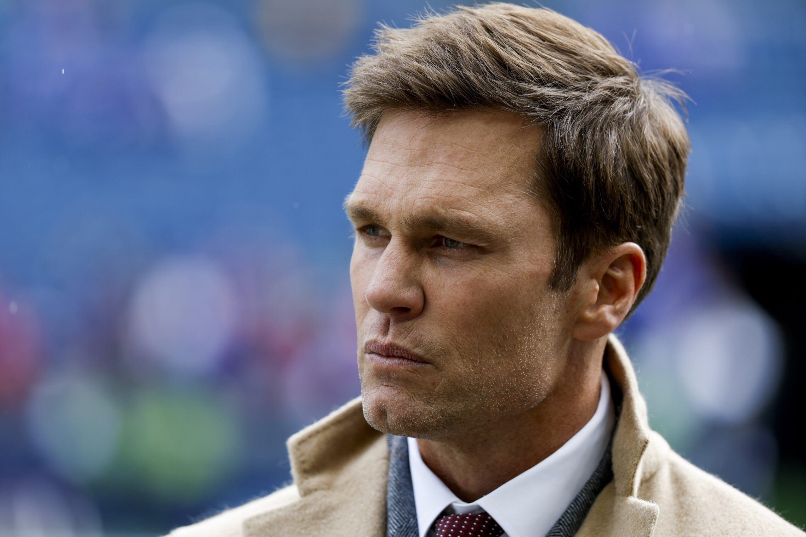 FOX commentator Tom Brady stands on the sideline before a game between the Seattle Seahawks and Buffalo Bills at Lumen Field.