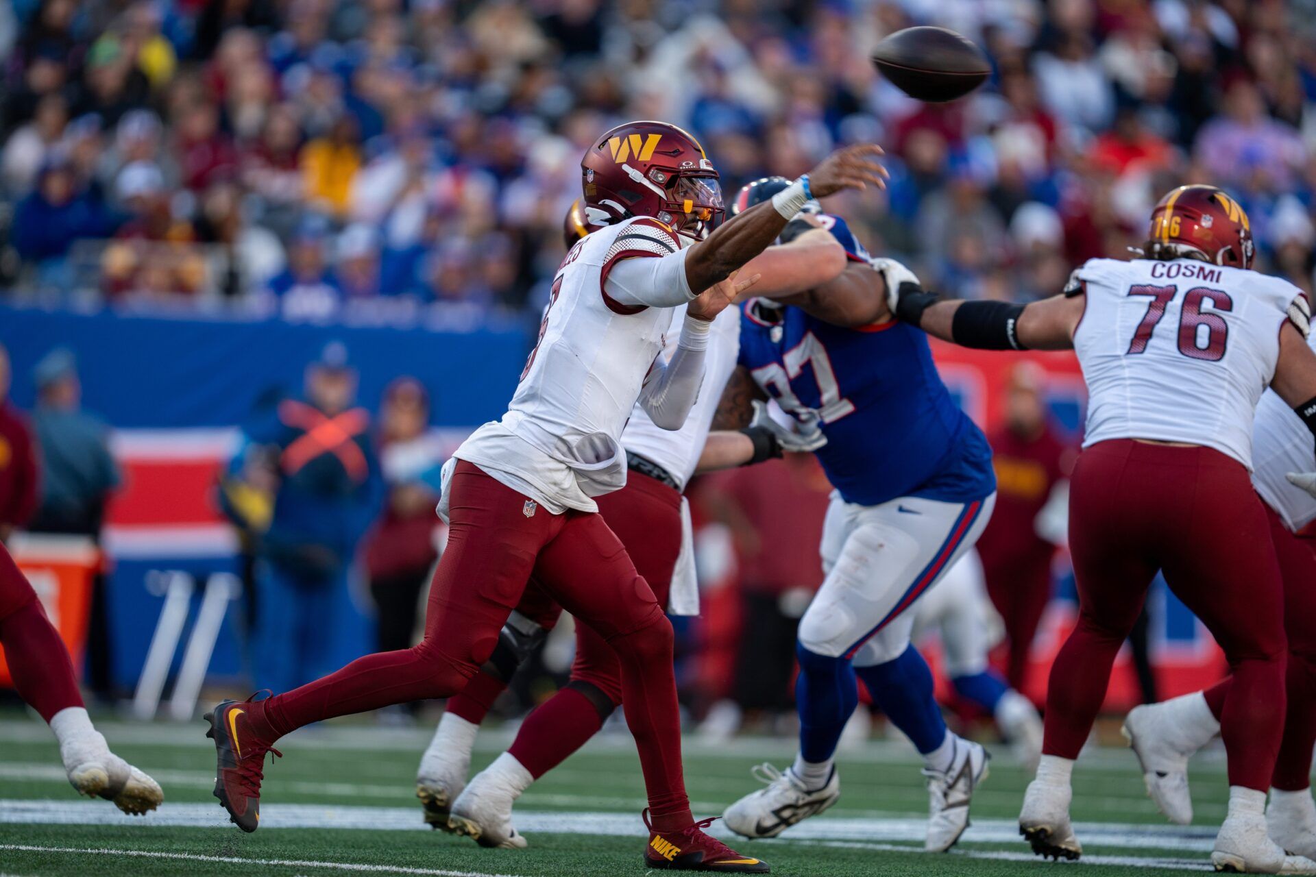 Washington Commanders quarterback Jayden Daniels (5) throws a pass during a game between the New York Giants and the Washington Commanders at MetLife Stadium in East Rutherford on Sunday, Nov. 3, 2024.