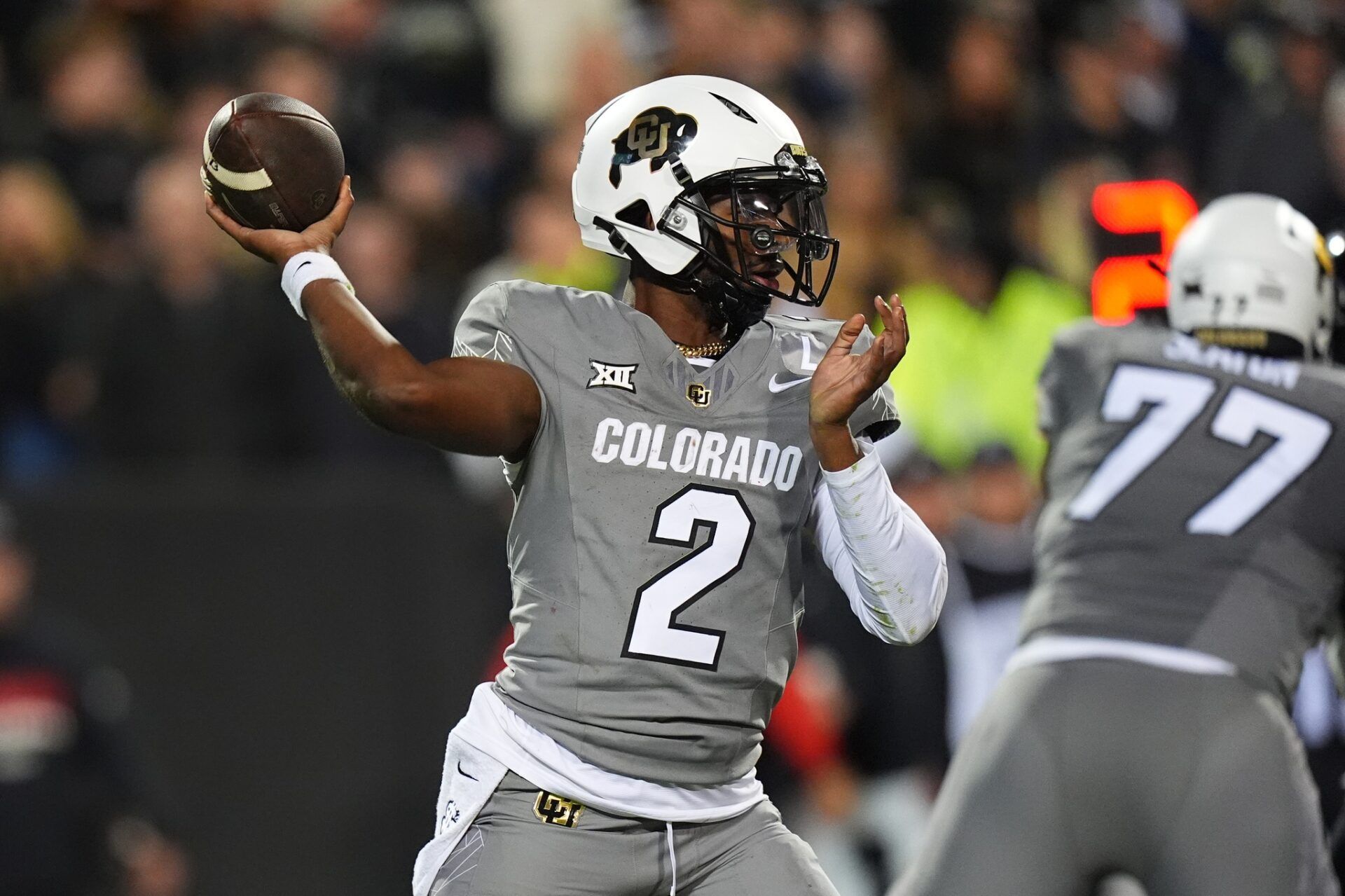 Colorado Buffaloes quarterback Shedeur Sanders (2) prepares to pass in the second half against the Cincinnati Bearcats at Folsom Field.