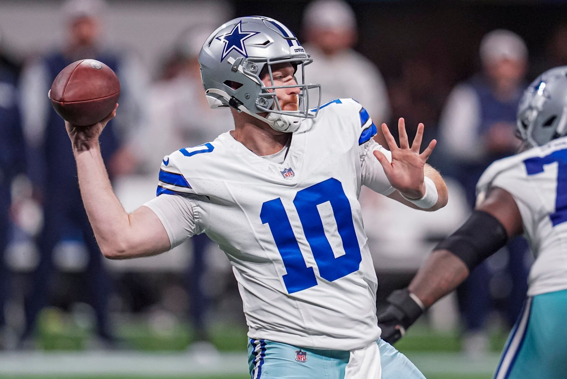 Nov 3, 2024; Atlanta, Georgia, USA; Dallas Cowboys quarterback Cooper Rush (10) passes against the Atlanta Falcons during the second half at Mercedes-Benz Stadium. Mandatory Credit: Dale Zanine-Imagn Images