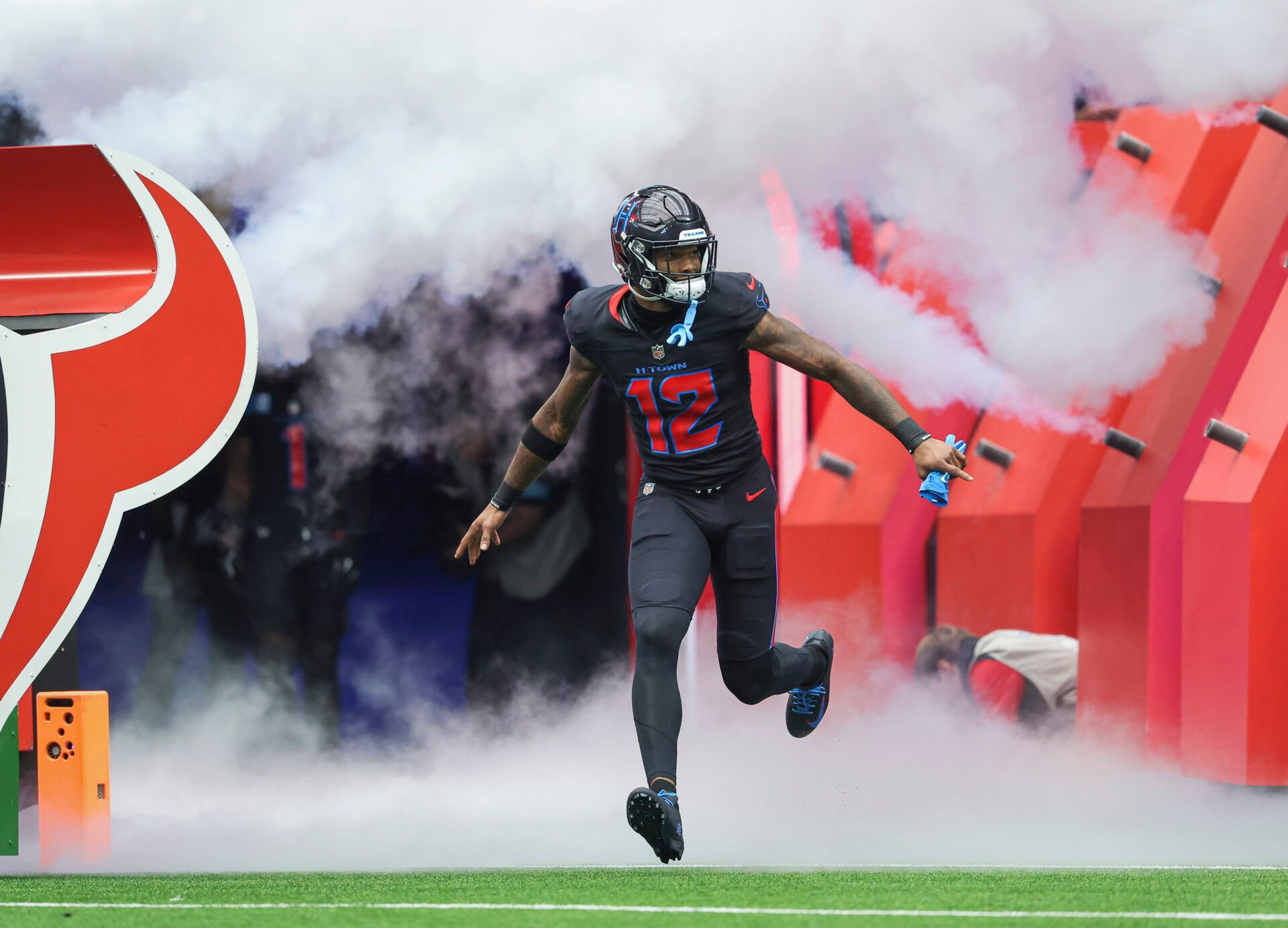 Oct 6, 2024; Houston, Texas, USA; Houston Texans wide receiver Nico Collins (12) is introduced before the game against the Buffalo Bills at NRG Stadium. Mandatory Credit: Troy Taormina-Imagn Images