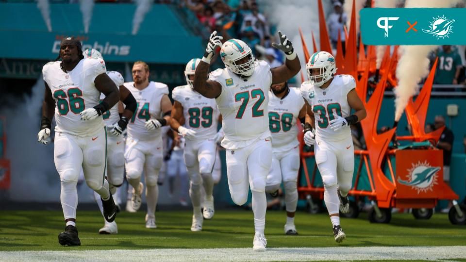 Miami Dolphins offensive tackle Terron Armstead (72) leads the team onto the field before a game against the Denver Broncos at Hard Rock Stadium.