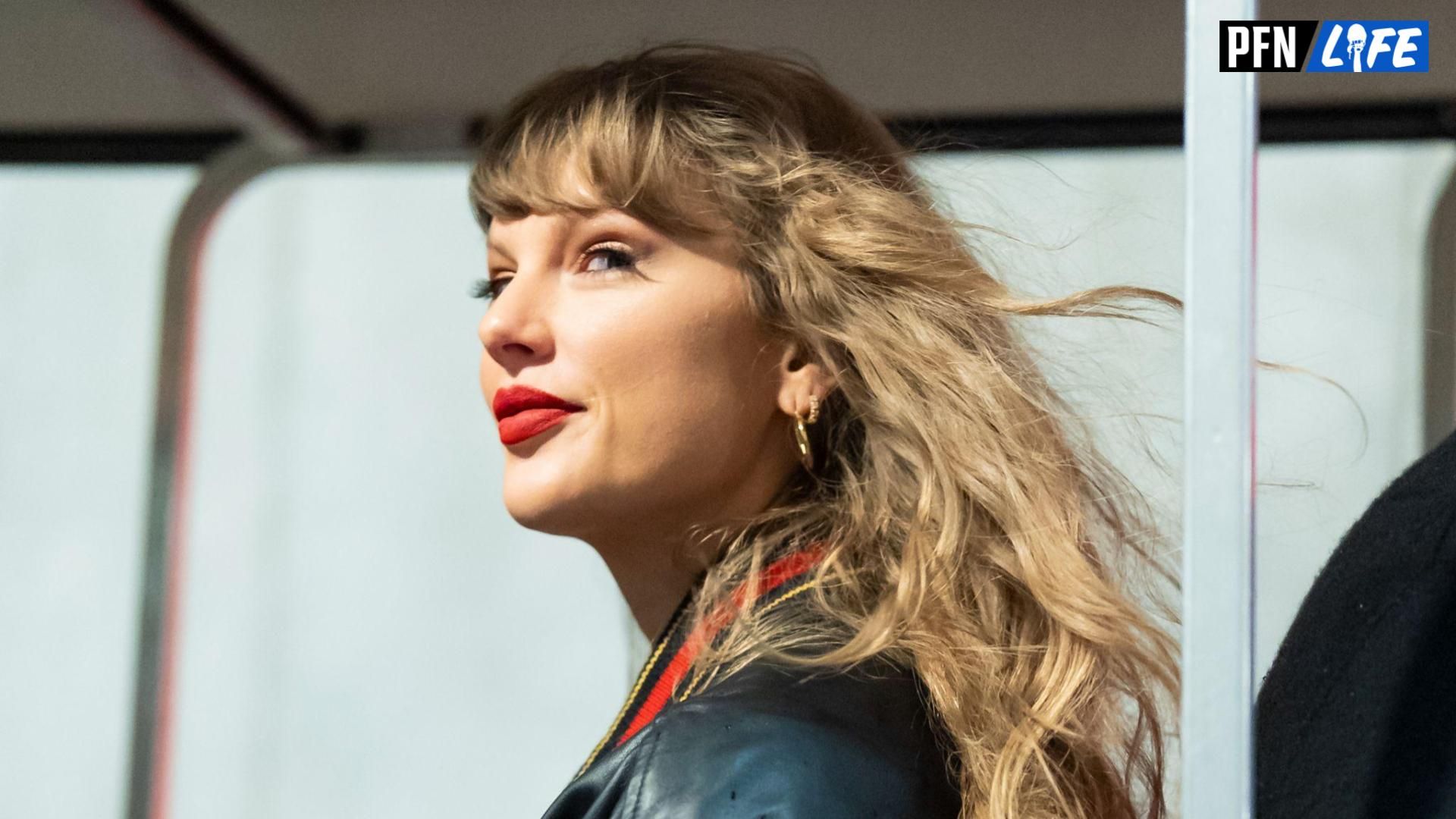 Taylor Swift suits up to cheer for Travis Kelce and the Chiefs as fans marvel at the pop icon's dressing sense for the game at Arrowhead.