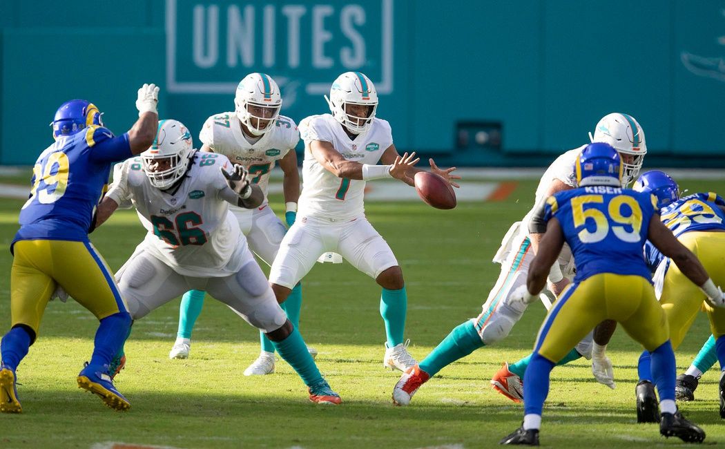 Miami Dolphins quarterback Tua Tagovailoa (1) takes a snap against the Los Angeles Rams at Hard Rock Stadium in Miami Gardens, November 1, 2020.