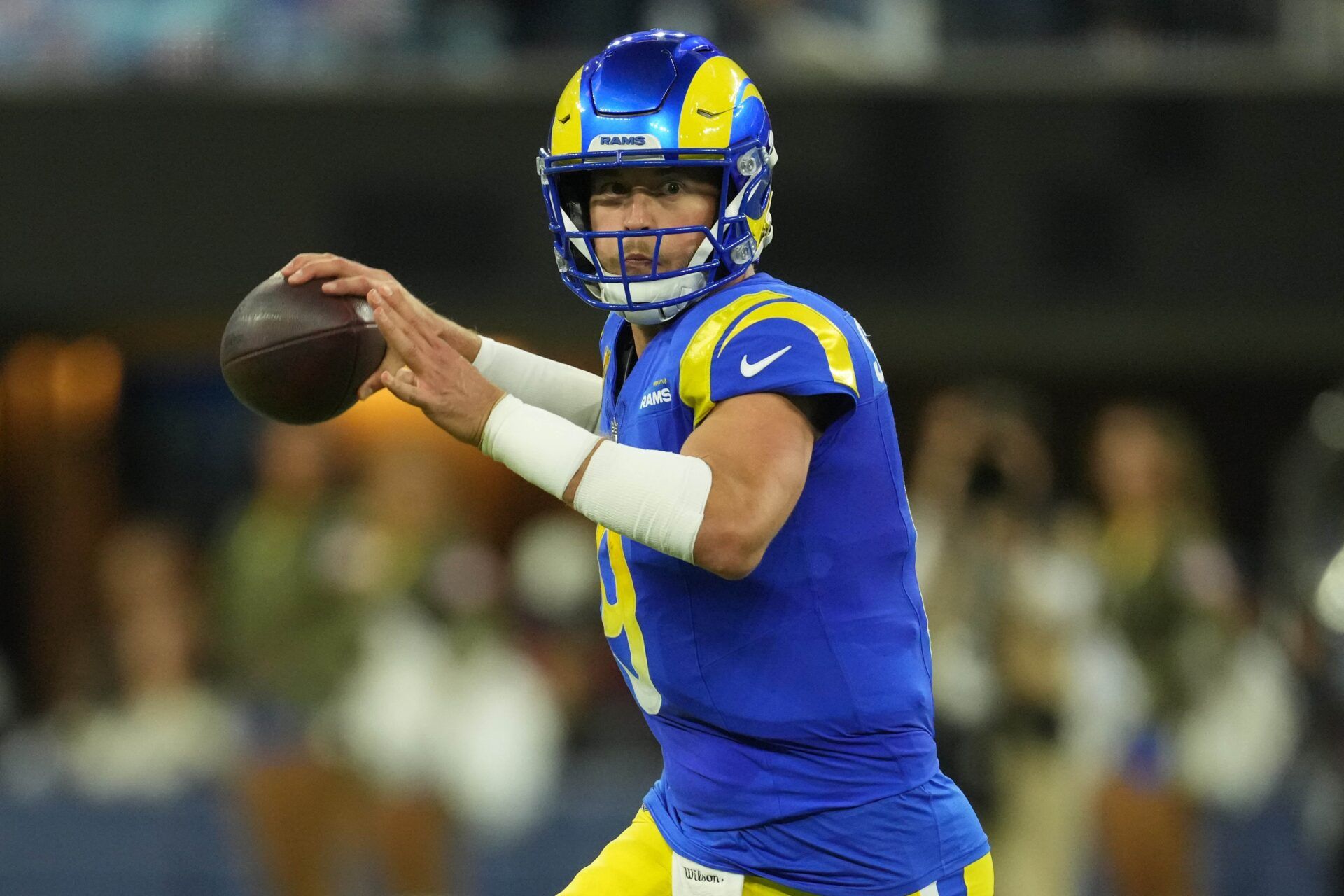 Los Angeles Rams quarterback Matthew Stafford (9) throws the ball against the Miami Dolphins in the second half at SoFi Stadium.