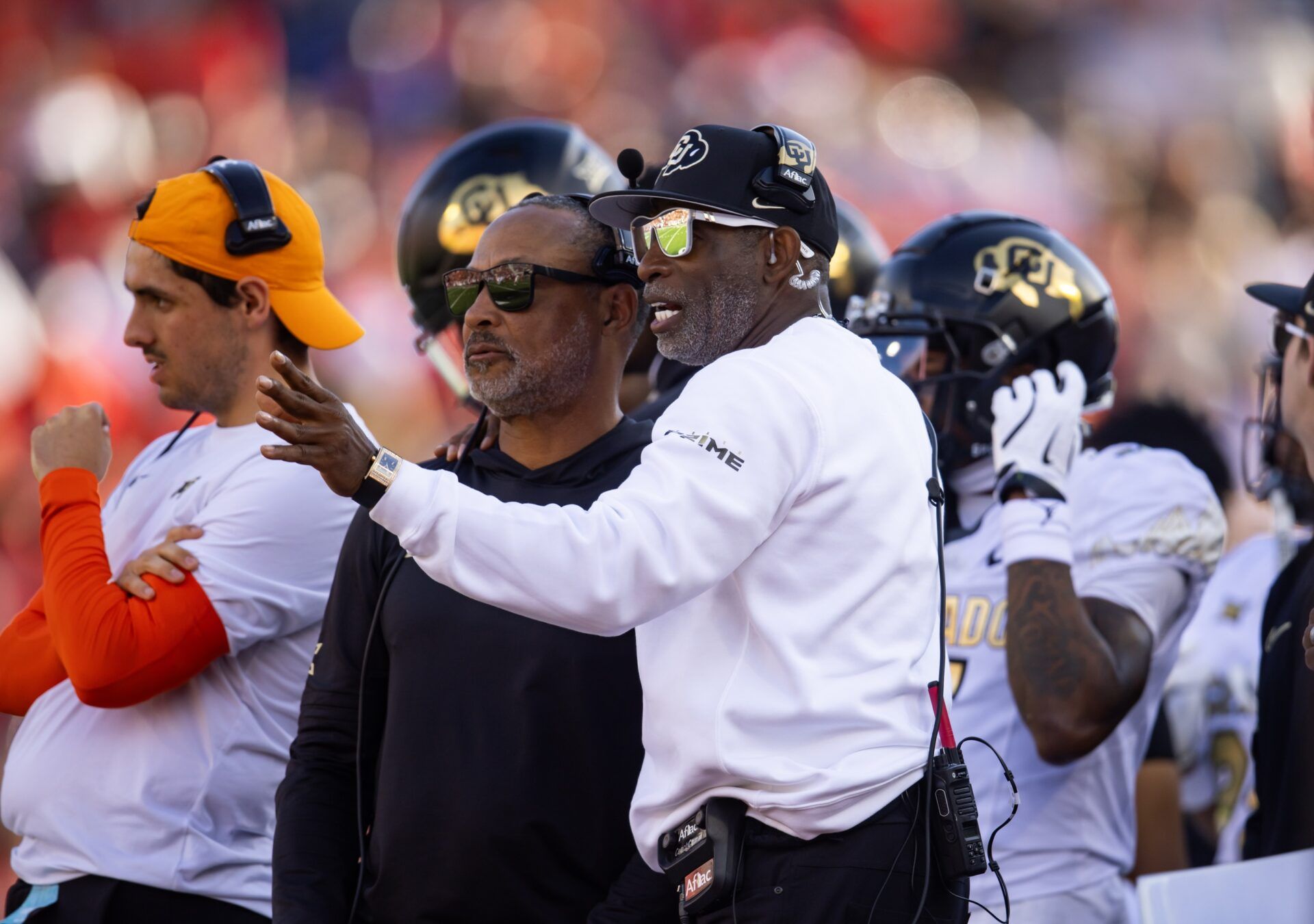 Colorado Buffalos head coach Deion Sanders (right) with wide receivers coach Jason Phillips against the Arizona Wildcats at Arizona Stadium.