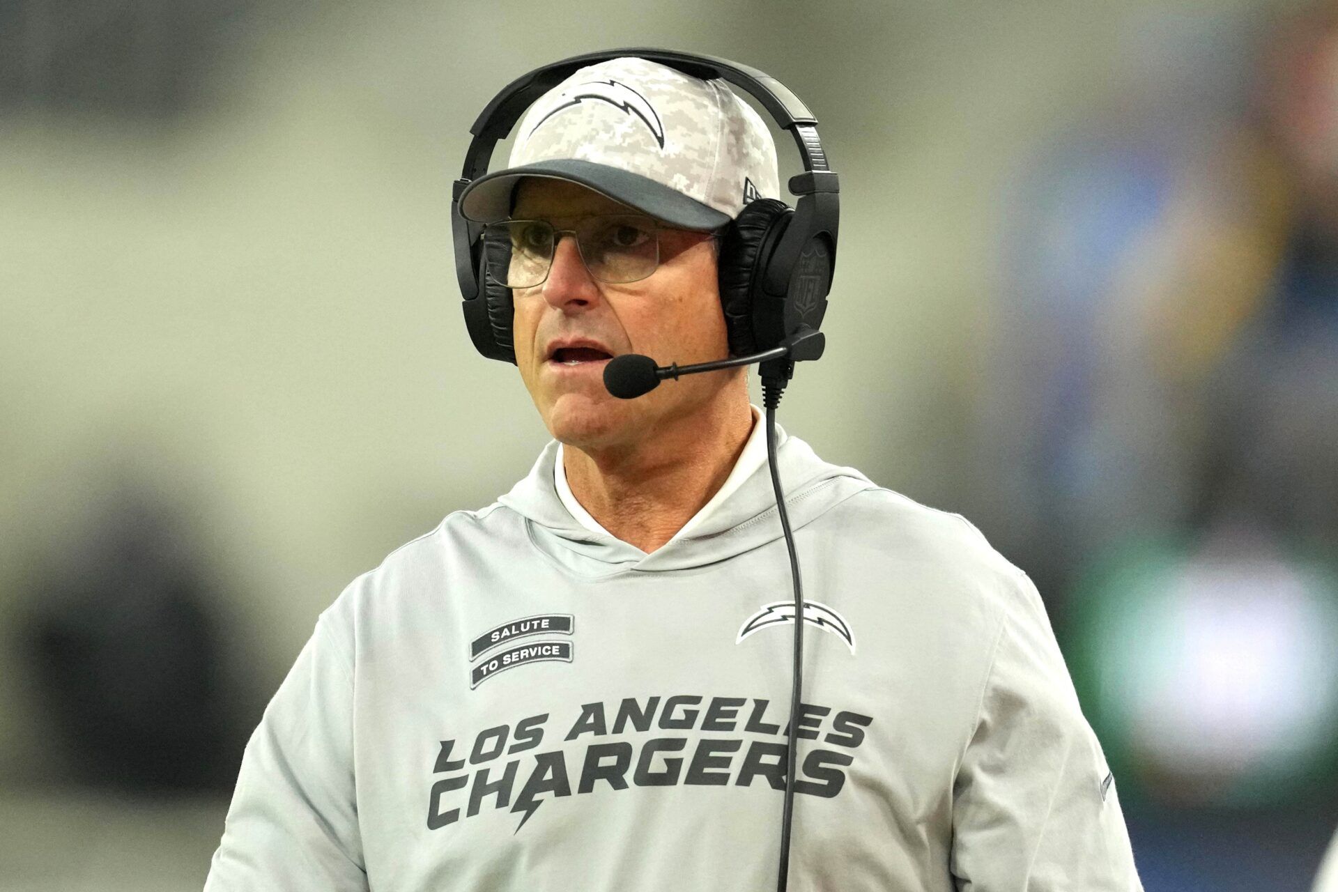 Los Angeles Chargers coach Jim Harbaugh reacts against the Baltimore Ravens in the first half at SoFi Stadium.