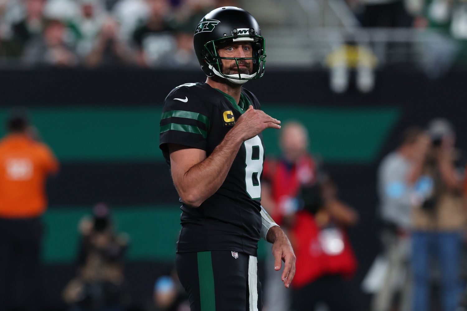 New York Jets quarterback Aaron Rodgers (8) during the first half of their game against the Houston Texans at MetLife Stadium.