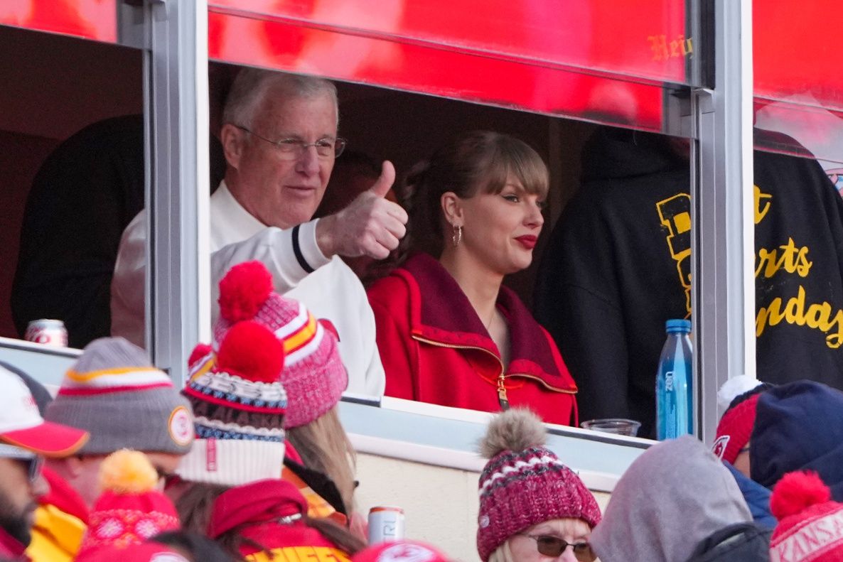 Pop star Taylor Swift watches the game with her father Scott against the Las Vegas Raiders during the first half at GEHA Field at Arrowhead Stadium.