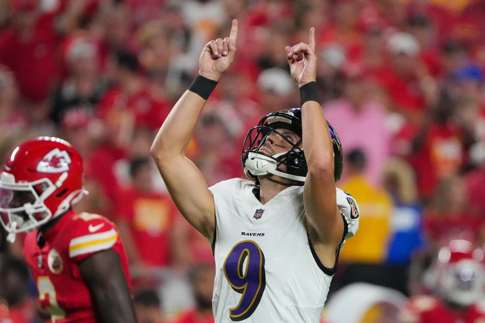 Baltimore Ravens kicker Justin Tucker (9) celebrates after kicking a field goal agains the Kansas City Chiefs during the first half at GEHA Field at Arrowhead Stadium.