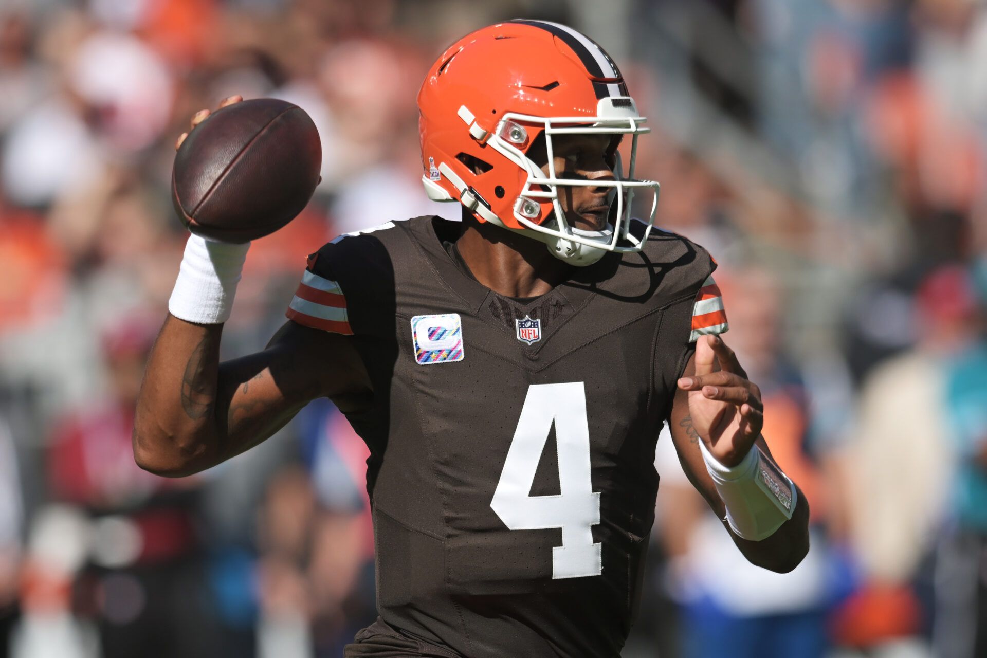 Oct 20, 2024; Cleveland, Ohio, USA; Cleveland Browns quarterback Deshaun Watson (4) throws a pass during the first quarter against the Cincinnati Bengals at Huntington Bank Field. Mandatory Credit: Ken Blaze-Imagn Images