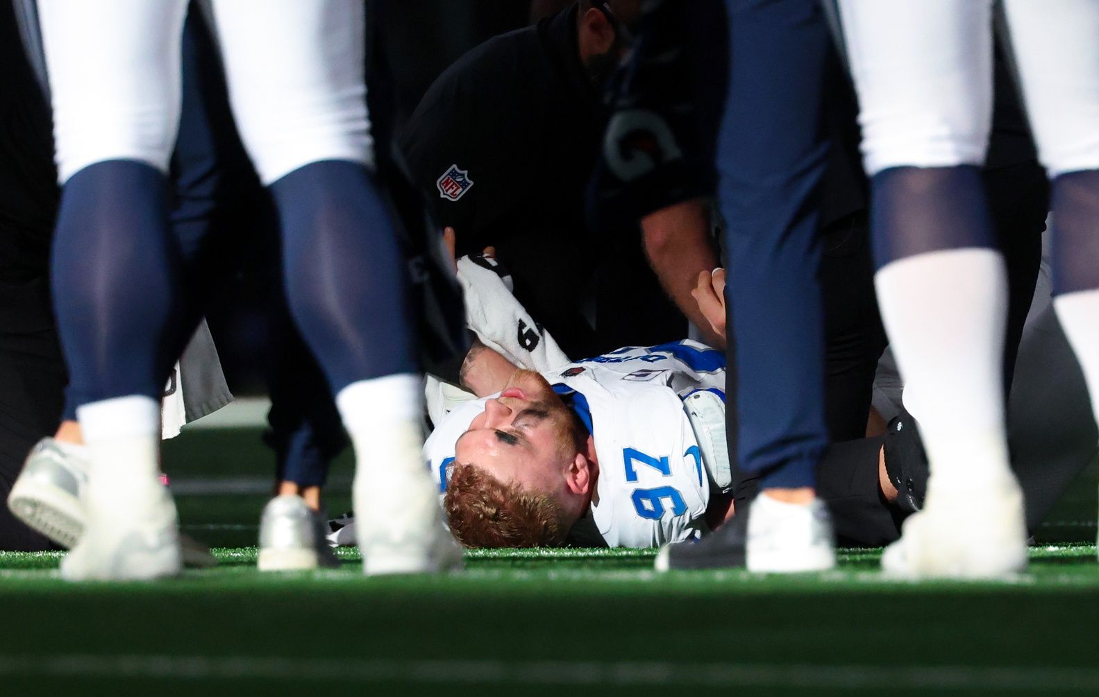 Detroit Lions defensive end Aidan Hutchinson (97) lays injured during the second half against the Dallas Cowboys at AT&T Stadium.