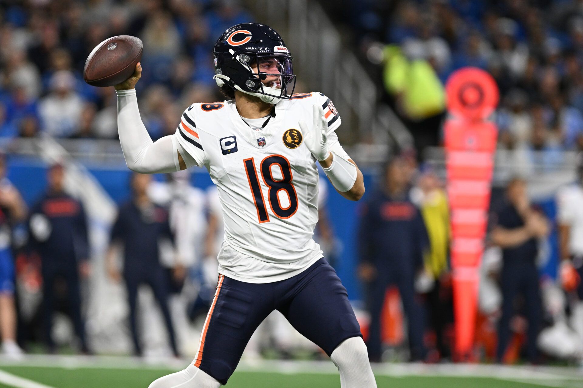 Nov 28, 2024; Detroit, Michigan, USA; Chicago Bears quarterback Caleb Williams (18) throws a pass against the Detroit Lions in the second quarter at Ford Field. Mandatory Credit: Lon Horwedel-Imagn Images