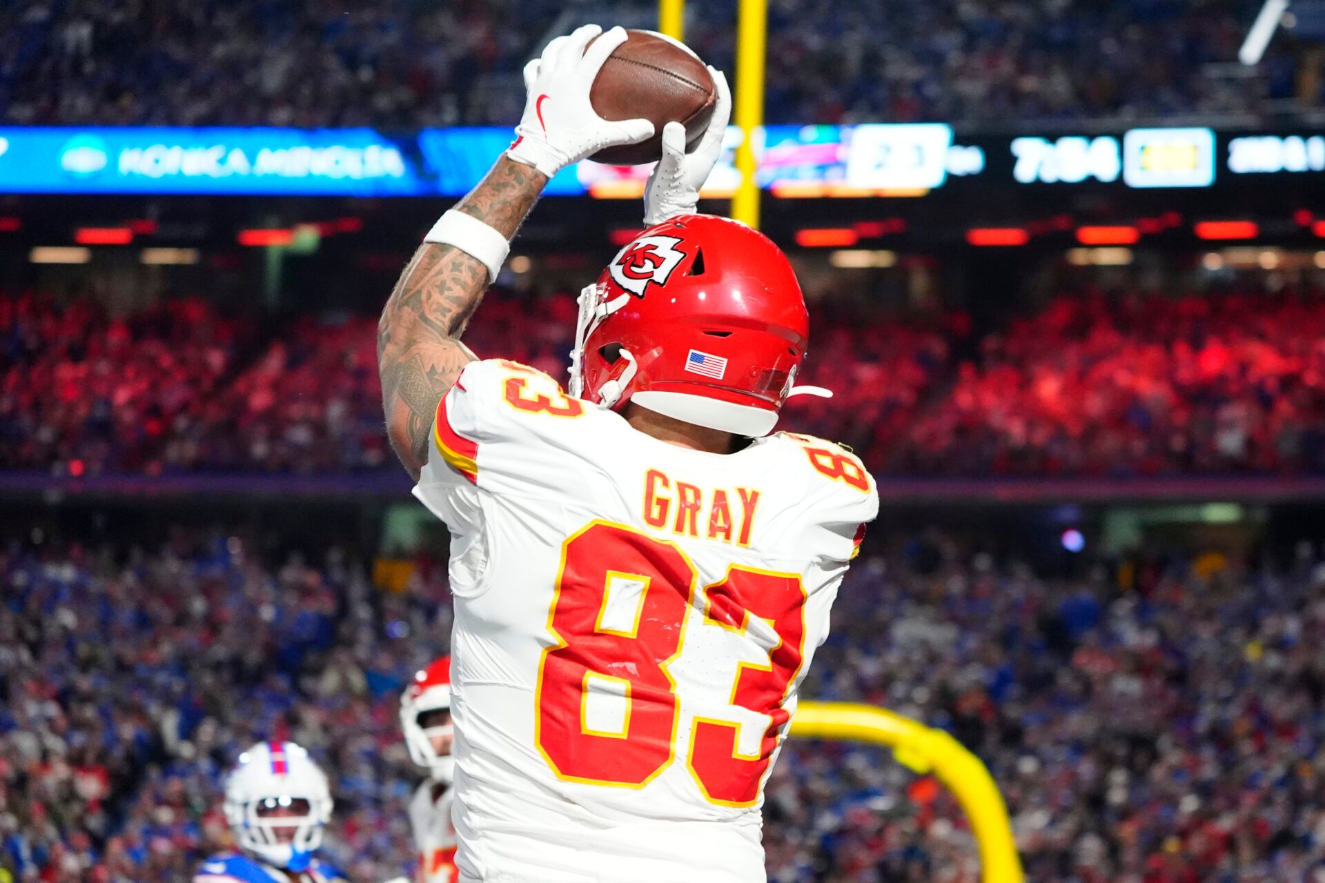 Nov 17, 2024; Orchard Park, aNew York, USA; Kansas City Chiefs tight end Noah Gray (83) makes a catch for a touchdown against the Buffalo Bills during the second half at Highmark Stadium. Mandatory Credit: Gregory Fisher-Imagn Images