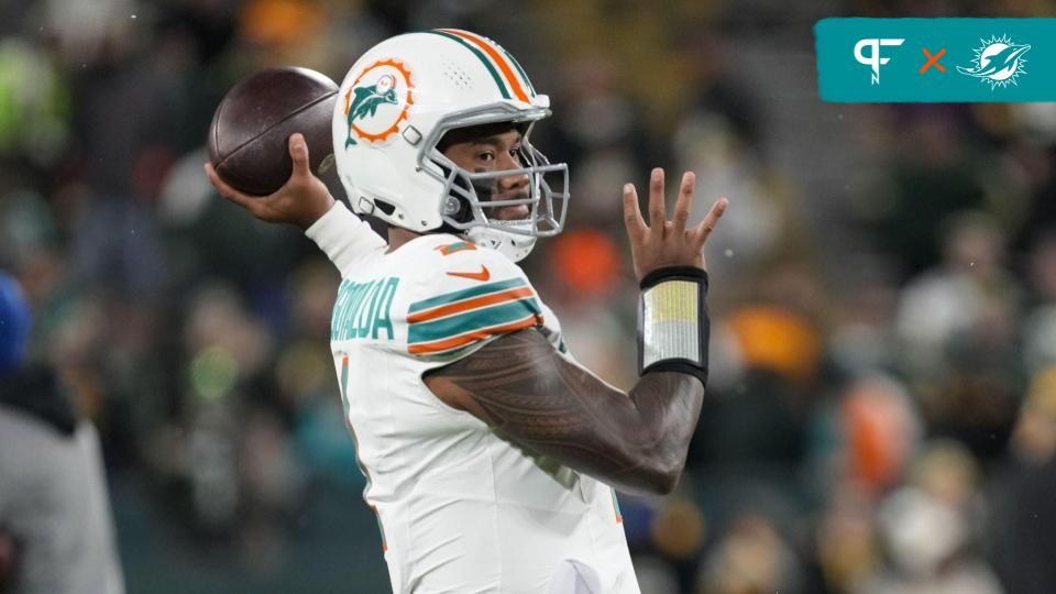 Miami Dolphins quarterback Tua Tagovailoa (1) throws a pass during warmups prior to the game against the Green Bay Packers at Lambeau Field.