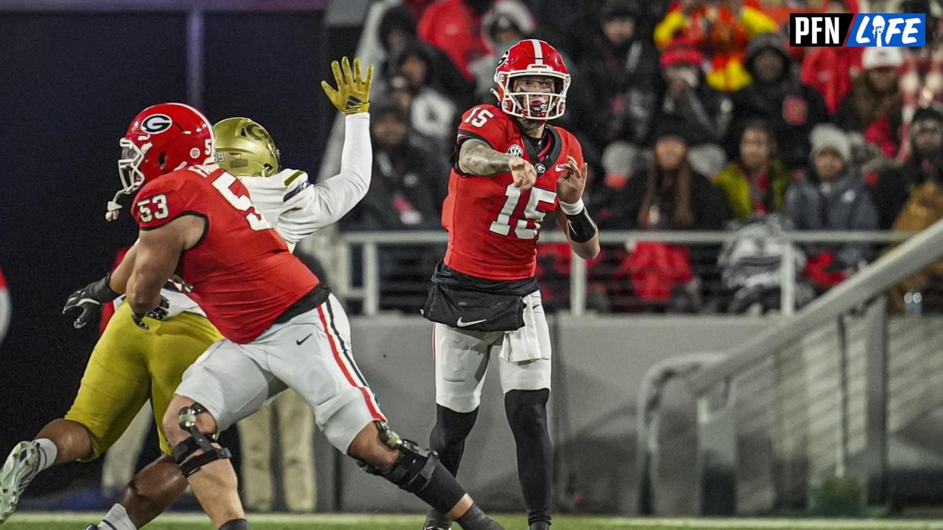 Georgia Bulldogs quarterback Carson Beck (15) passes against the Georgia Tech Yellow Jackets during the first quarter at Sanford Stadium.