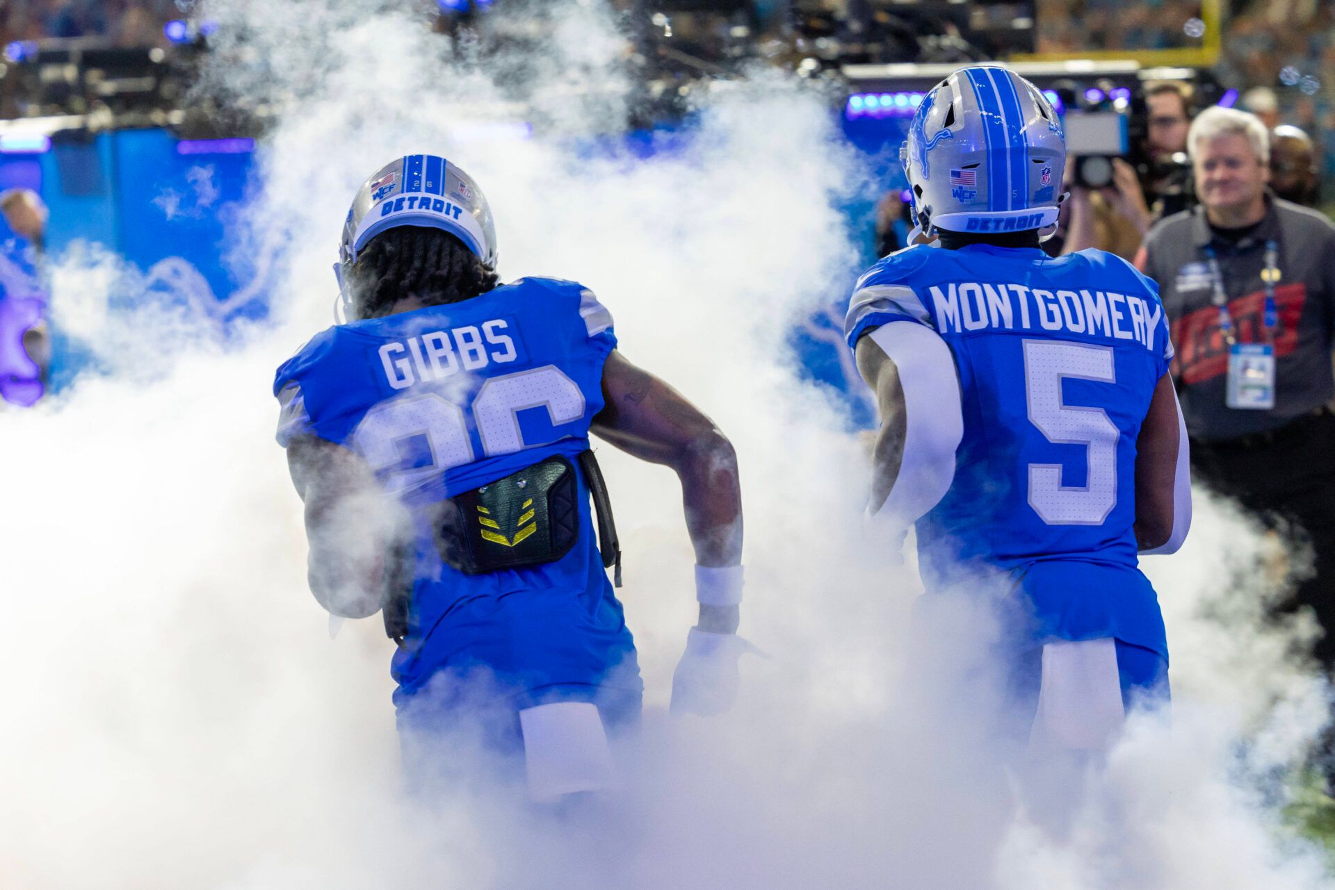 Nov 28, 2024; Detroit, Michigan, USA; Running backs for the Detroit Lions, David Montgomery (5) and Jahmyr Gibbs (26) are introduced before the game against the Chicago Bears at Ford Field. Mandatory Credit: David Reginek-Imagn Images