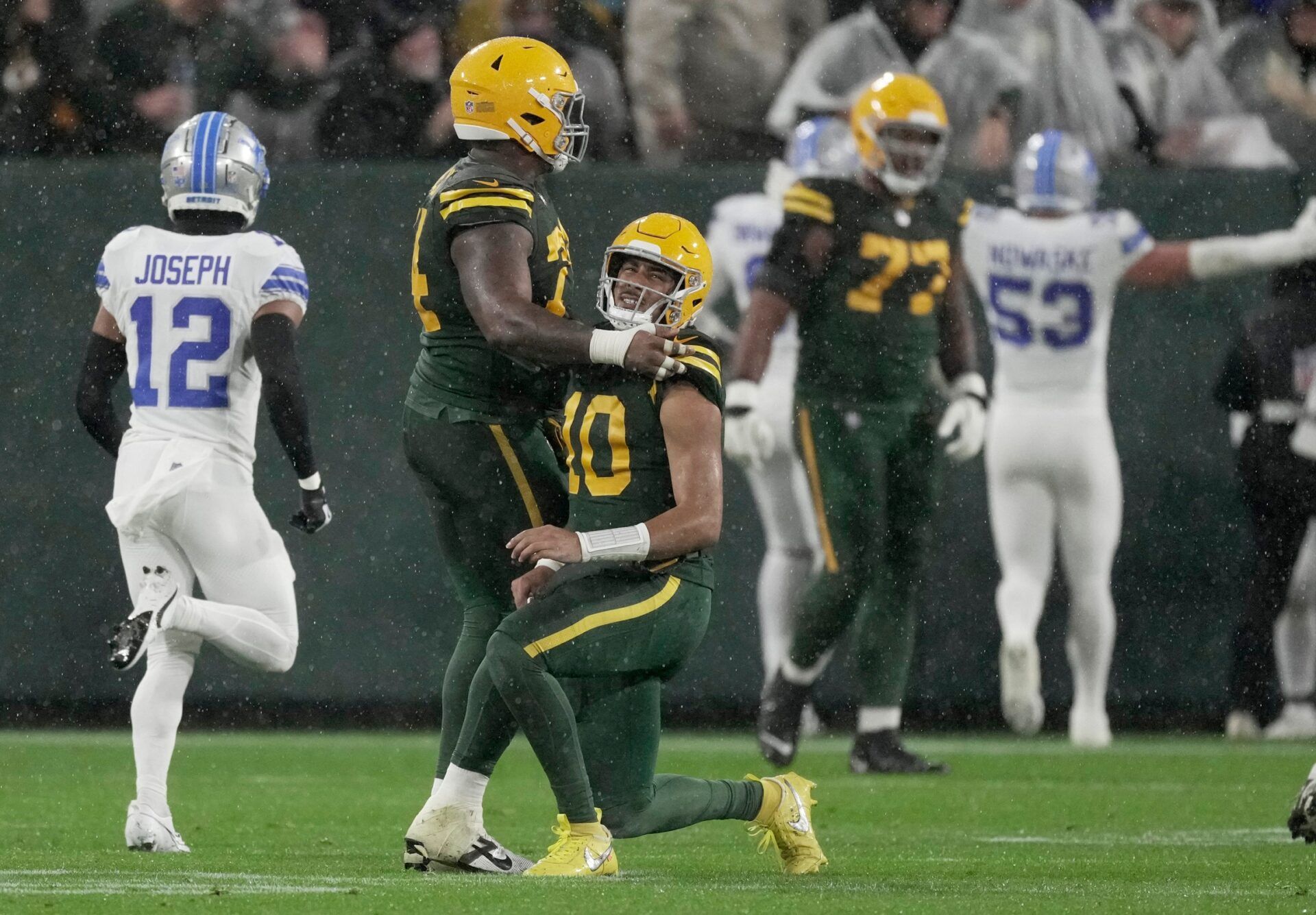 Green Bay Packers quarterback Jordan Love (10) gets up after throwing an interception returned by a touchdown by Detroit Lions safety Kerby Joseph during the second quarter of their game Sunday, November 3, 2024 at Lambeau Field in Green Bay, Wisconsin.