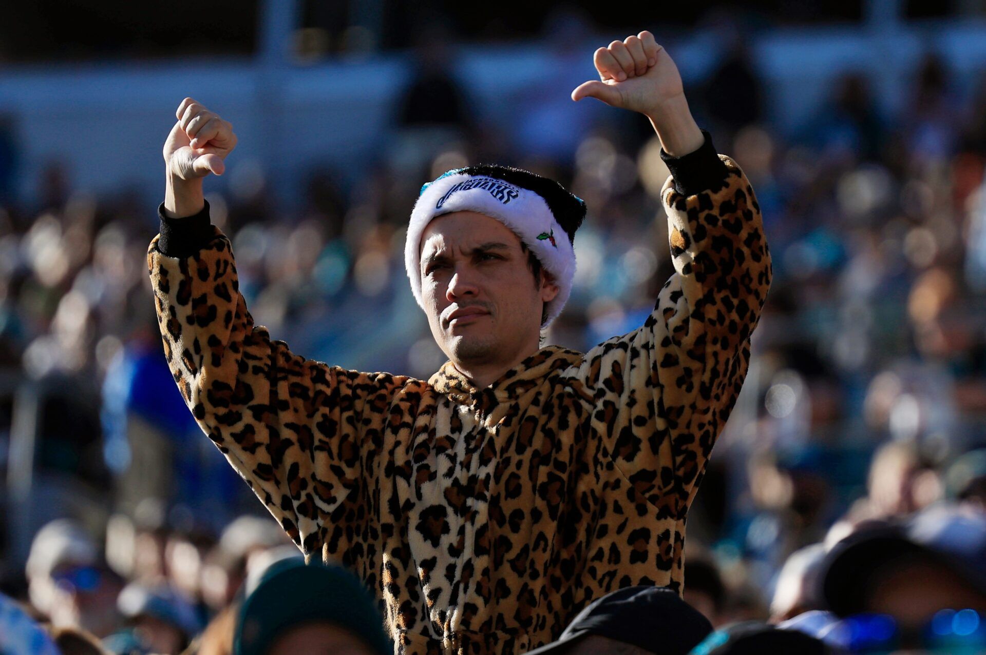 A Jacksonville Jaguars fan disapproves of a Houston Texans touchdown score during the third quarter of an NFL football matchup Sunday, Dec. 1, 2024 at EverBank Stadium in Jacksonville, Fla. The Texans held off the Jaguars 23-20.