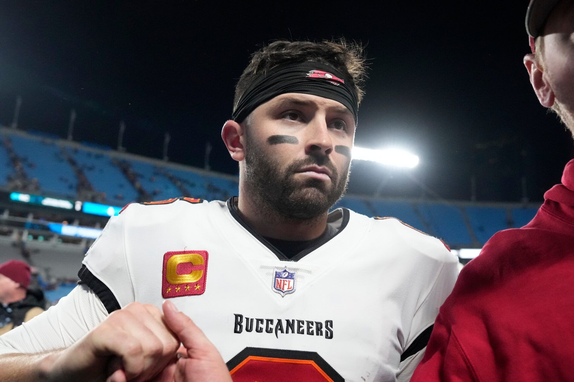 Tampa Bay Buccaneers quarterback Baker Mayfield (6) leaves the field after winning the game at Bank of America Stadium.