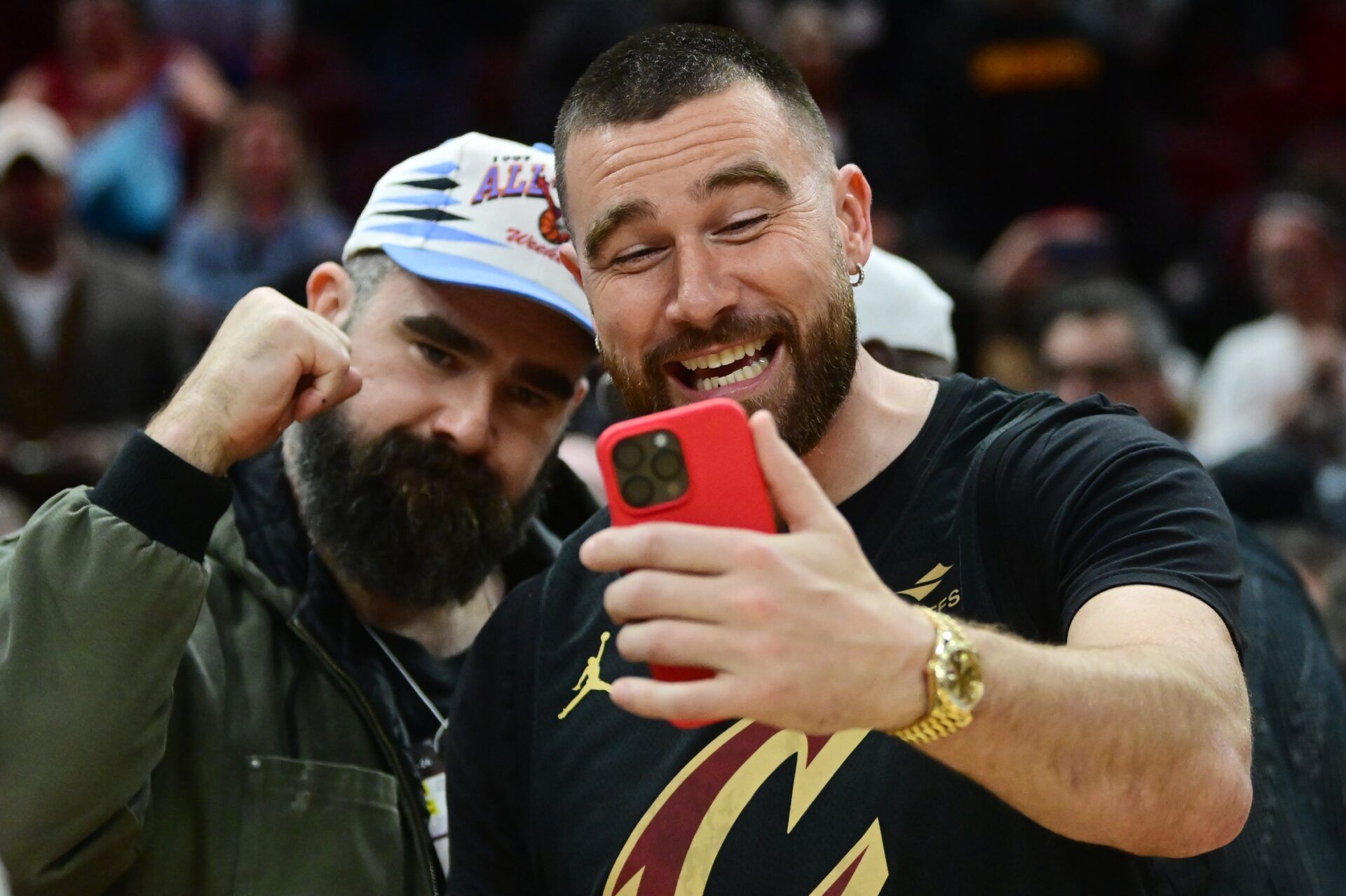 Cleveland natives and NFL players Travis, right, and Jason Kelce celebrate after the Cleveland Cavaliers beat the Boston Celtics during the second half at Rocket Mortgage FieldHouse.