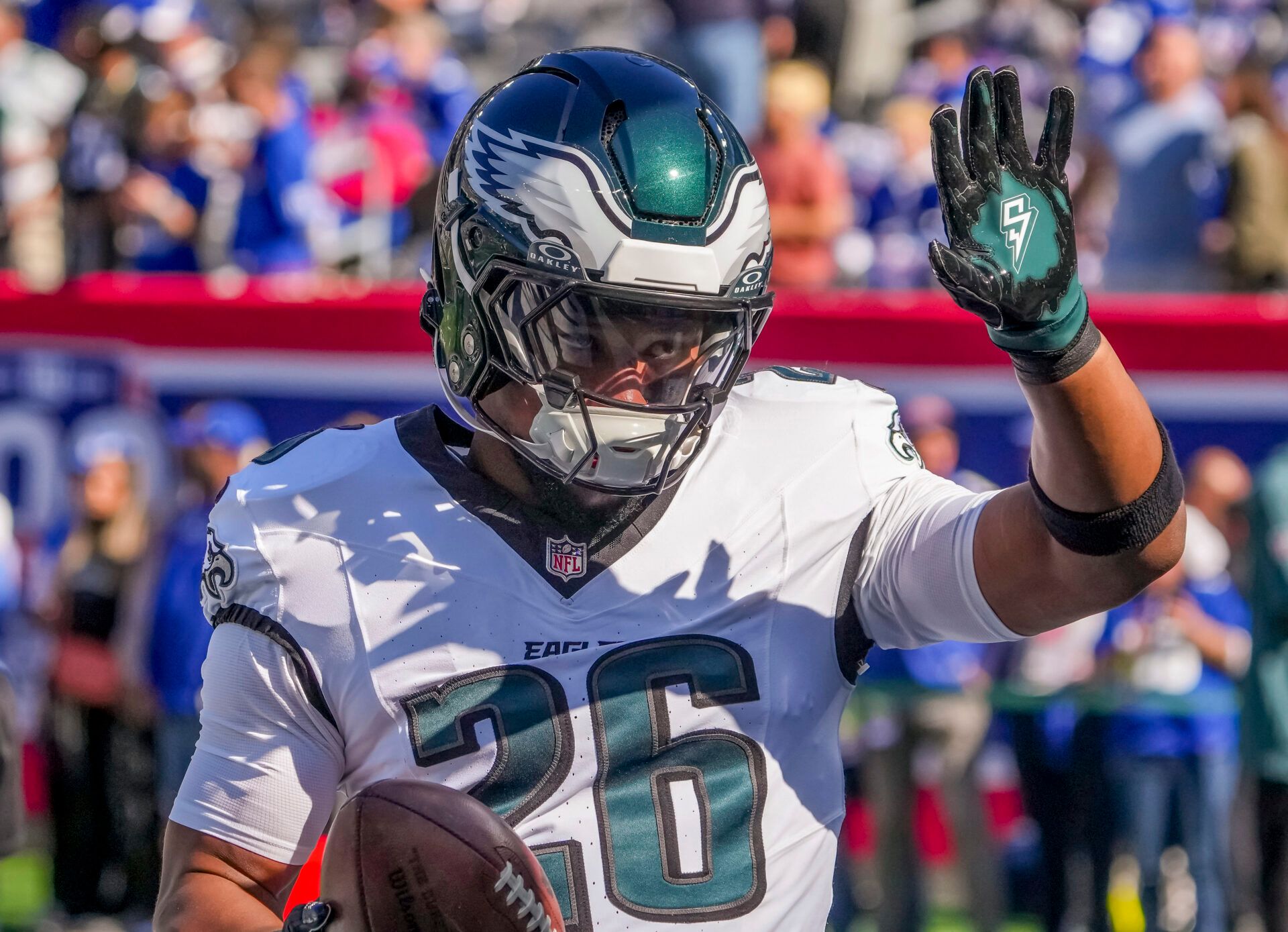 Oct 20, 2024; East Rutherford, New Jersey, USA; Philadelphia Eagles running back (and former NY Giants back) Saquon Barkley (26) greets fans at MetLife Stadium. Mandatory Credit: Robert Deutsch-Imagn Images