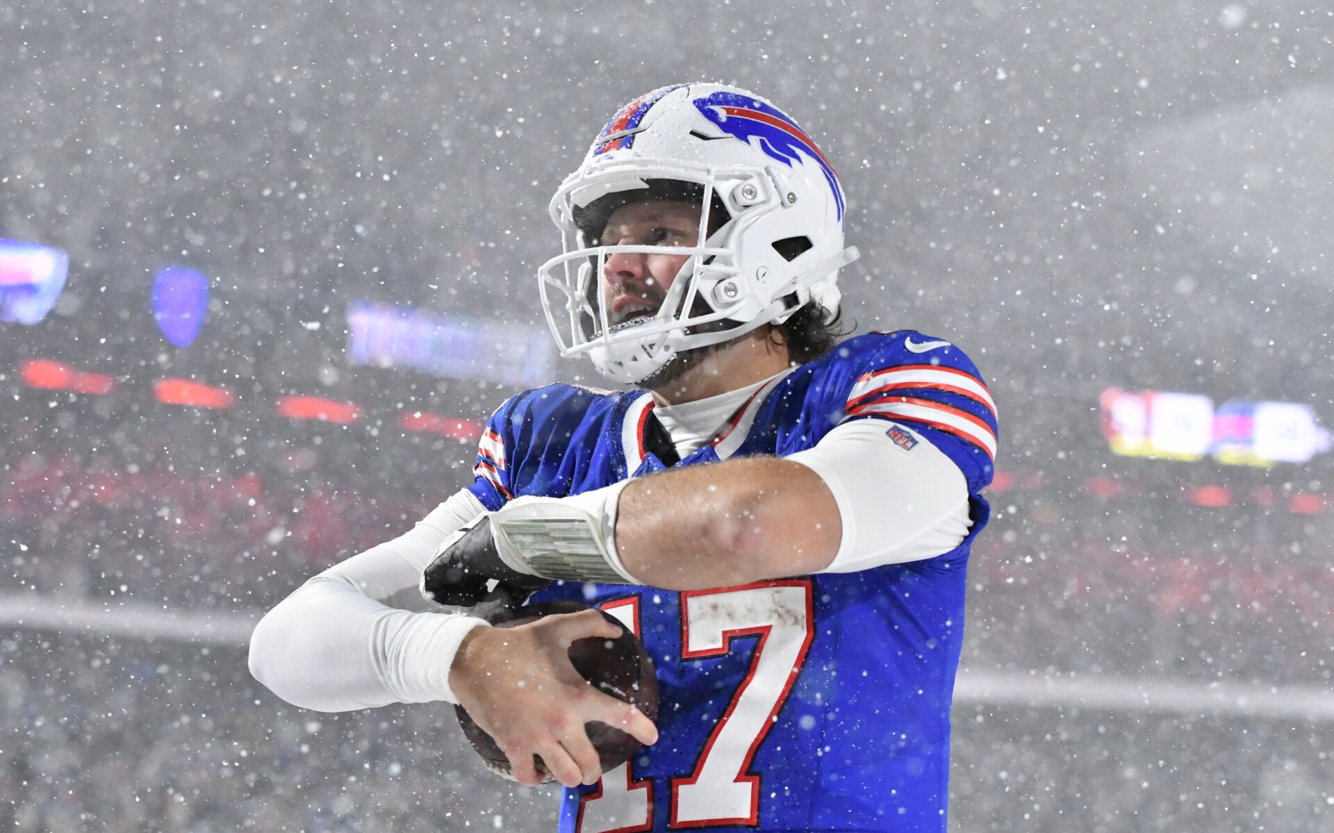 Dec 1, 2024; Orchard Park, New York, USA; Buffalo Bills quarterback Josh Allen (17) reacts to scoring a rushing touchdown against the San Francisco 49ers in the third quarter at Highmark Stadium. Mandatory Credit: Mark Konezny-Imagn Images