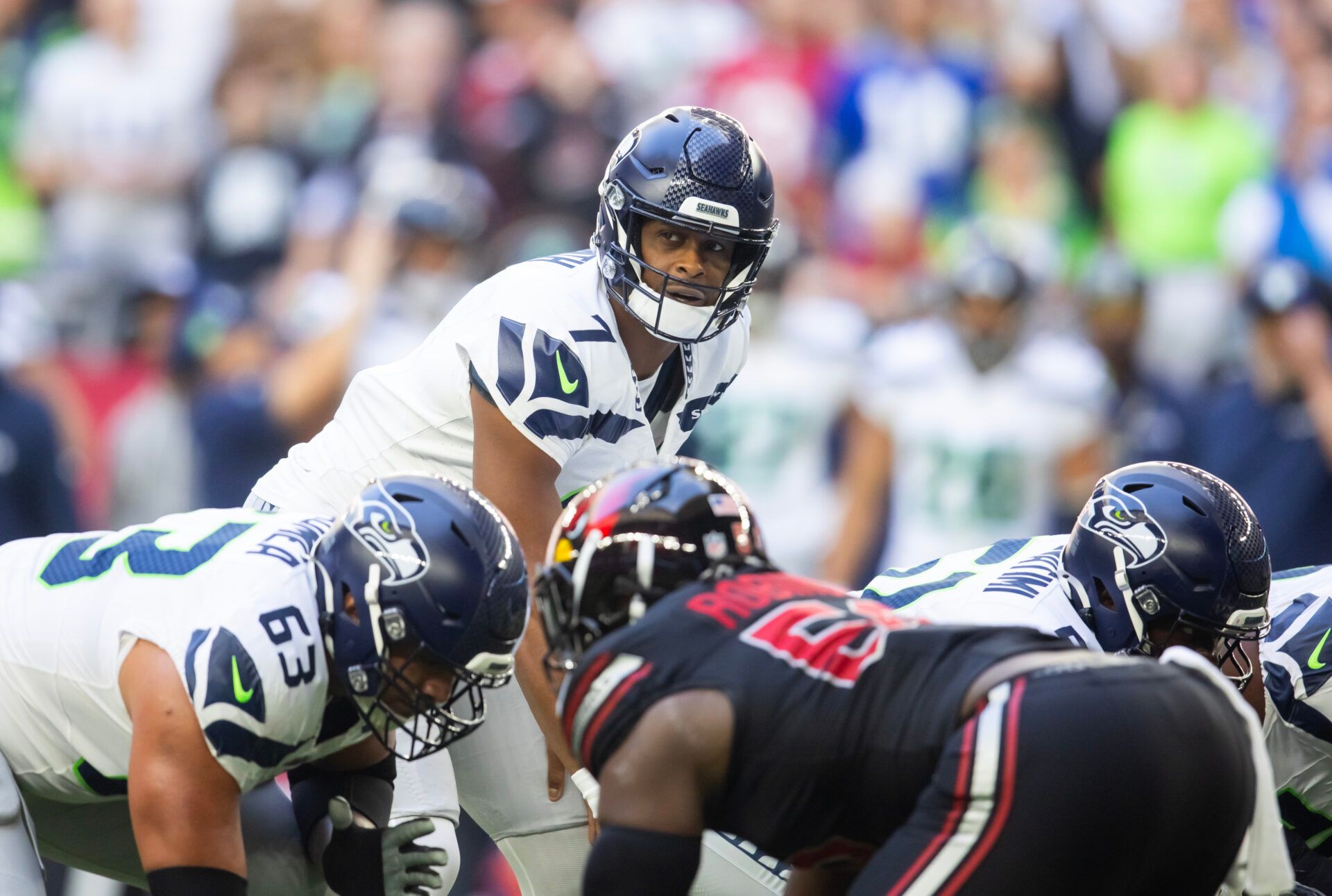 Dec 8, 2024; Glendale, Arizona, USA; Seattle Seahawks quarterback Geno Smith (7) against the Arizona Cardinals at State Farm Stadium. Mandatory Credit: Mark J. Rebilas-Imagn Images