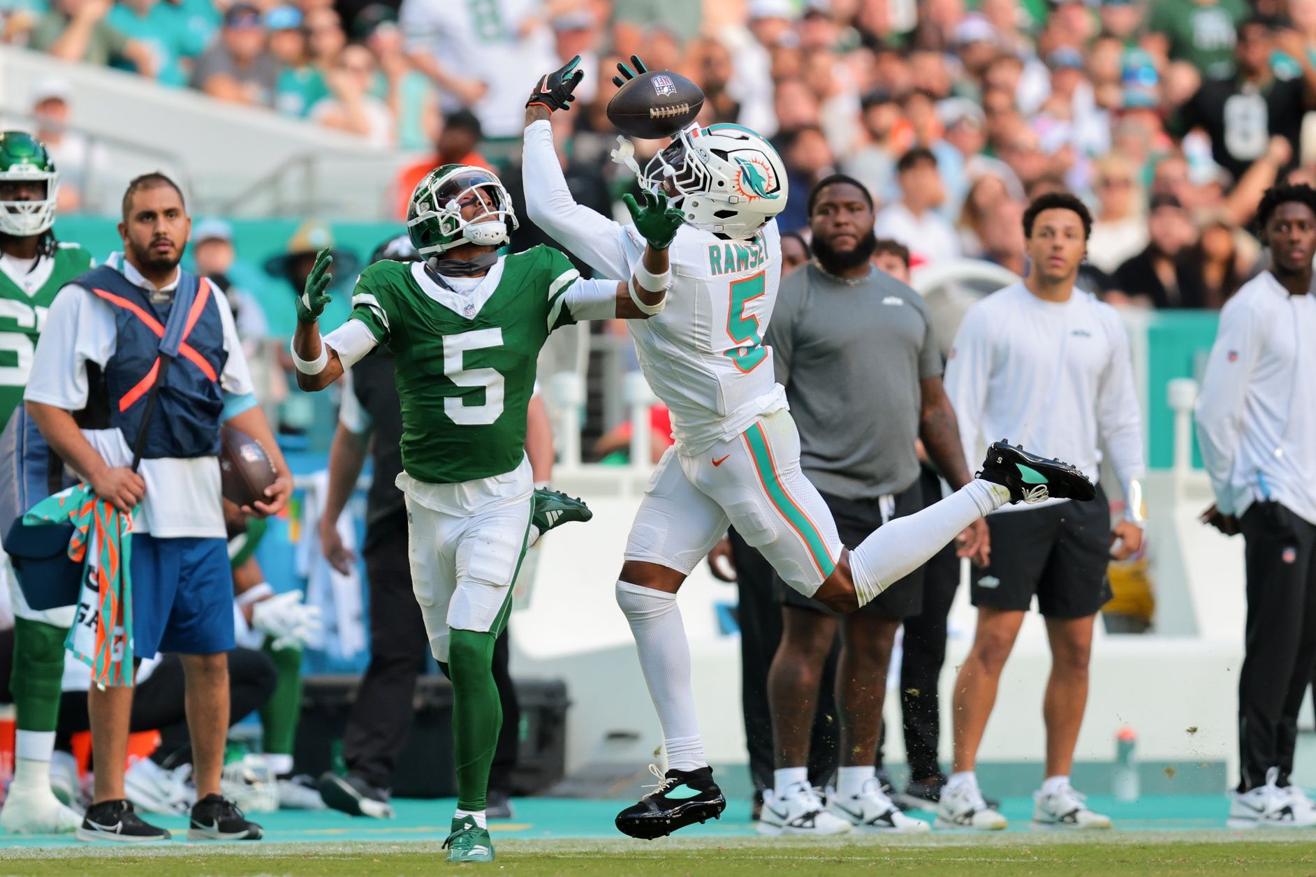 Miami Dolphins cornerback Jalen Ramsey (5) breaks a pass intended to New York Jets wide receiver Garrett Wilson (5) during the third quarter at Hard Rock Stadium.