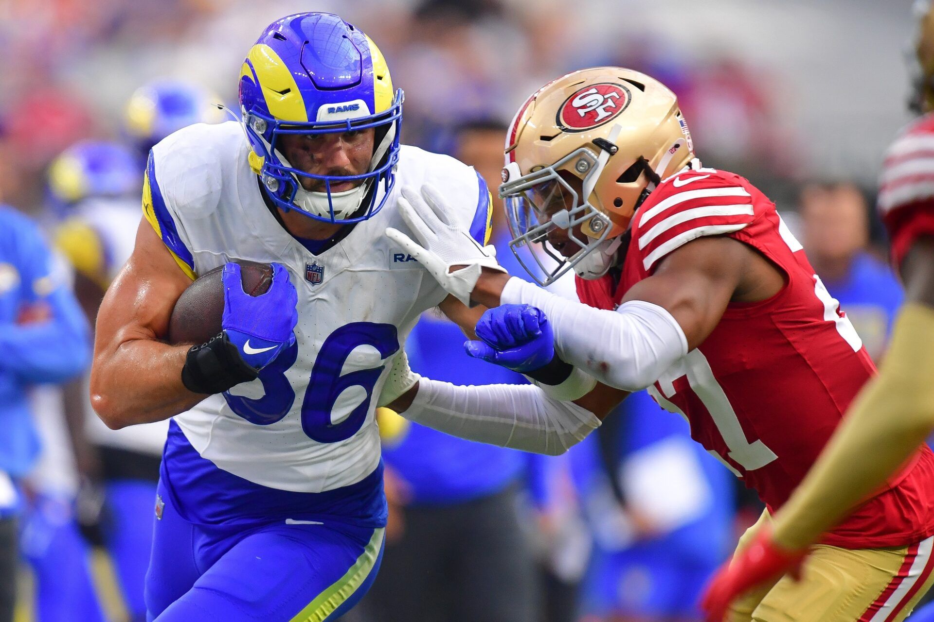 Los Angeles Rams tight end Colby Parkinson (86) runs the ball against San Francisco 49ers safety Ji'Ayir Brown (27) during the second half at SoFi Stadium.