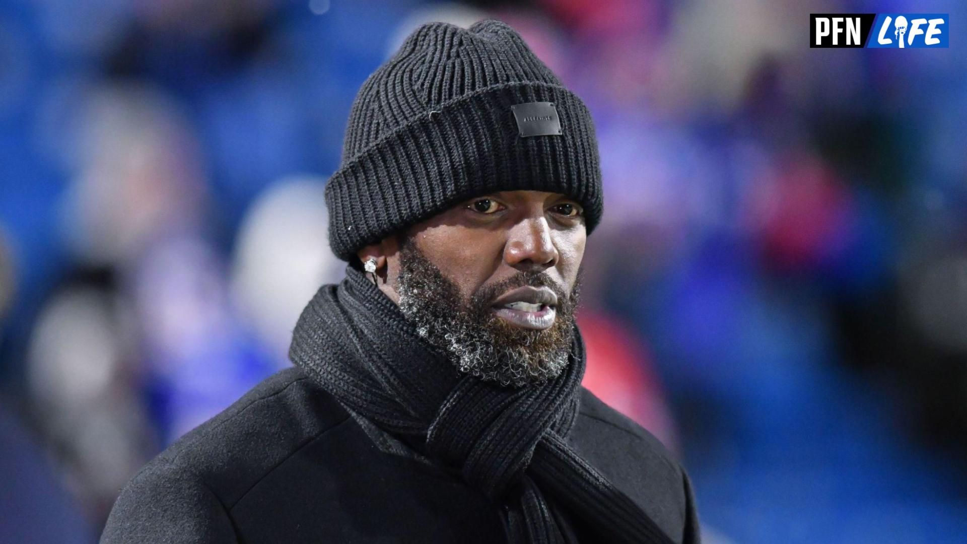 ESPN commentator and NFL Hall of Fame member Randy Moss on the sidelines before a game between the Buffalo Bills and New England Patriots at Highmark Stadium.