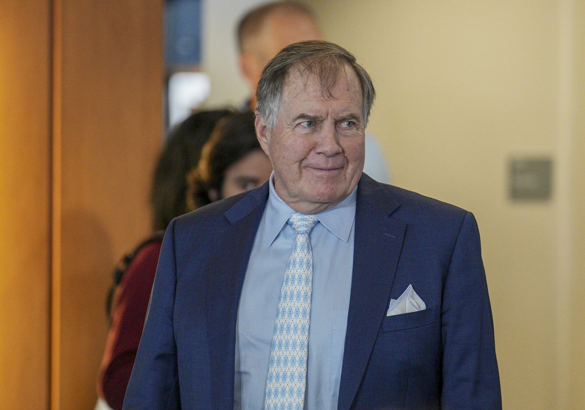 North Carolina Tar Heels new head coach Bill Belichick walks to his seat for the announcement of his hiring at Loudermilk Center for Excellence.