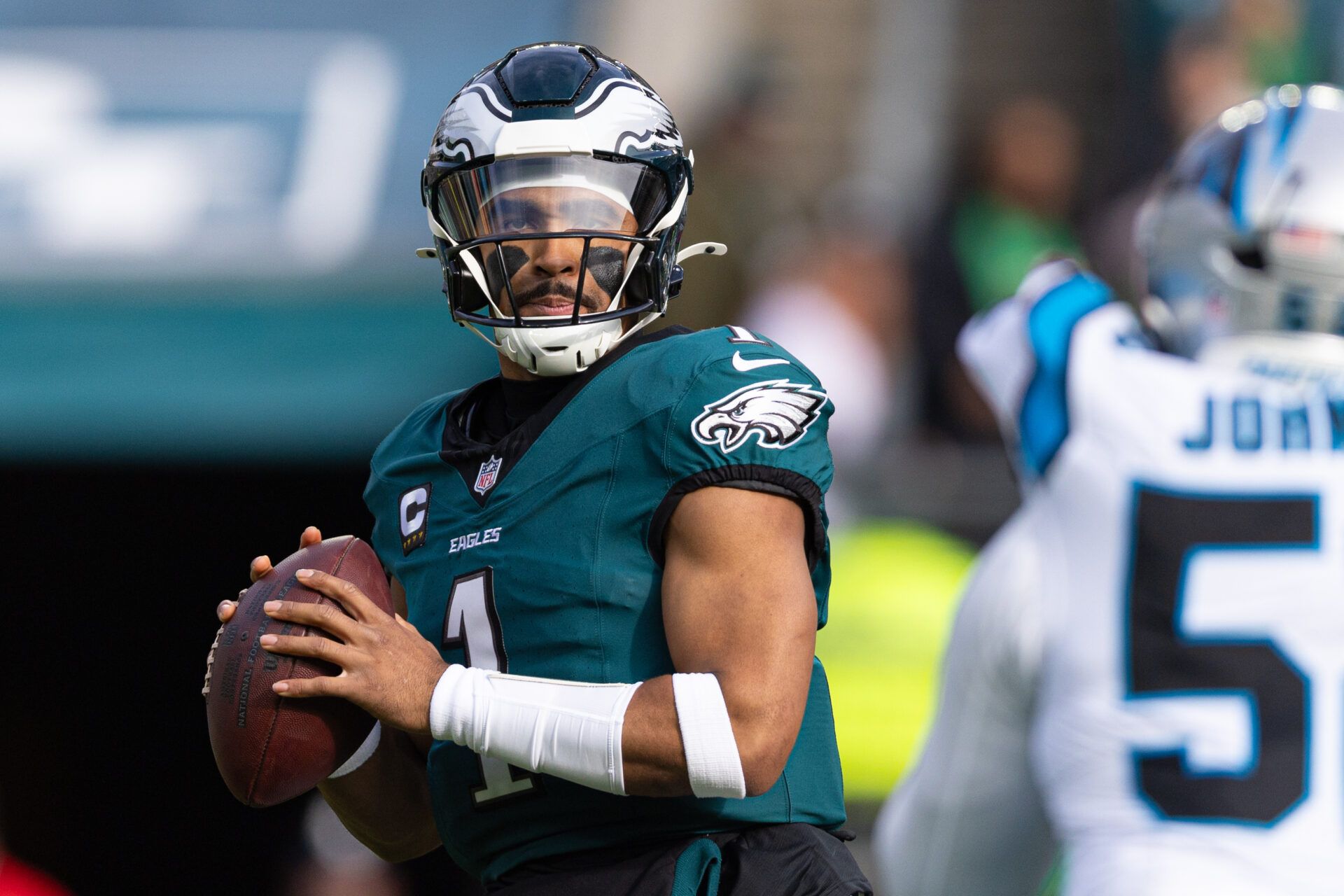 Dec 8, 2024; Philadelphia, Pennsylvania, USA; Philadelphia Eagles quarterback Jalen Hurts (1) in action against the Carolina Panthers during the first quarter at Lincoln Financial Field. Mandatory Credit: Bill Streicher-Imagn Images