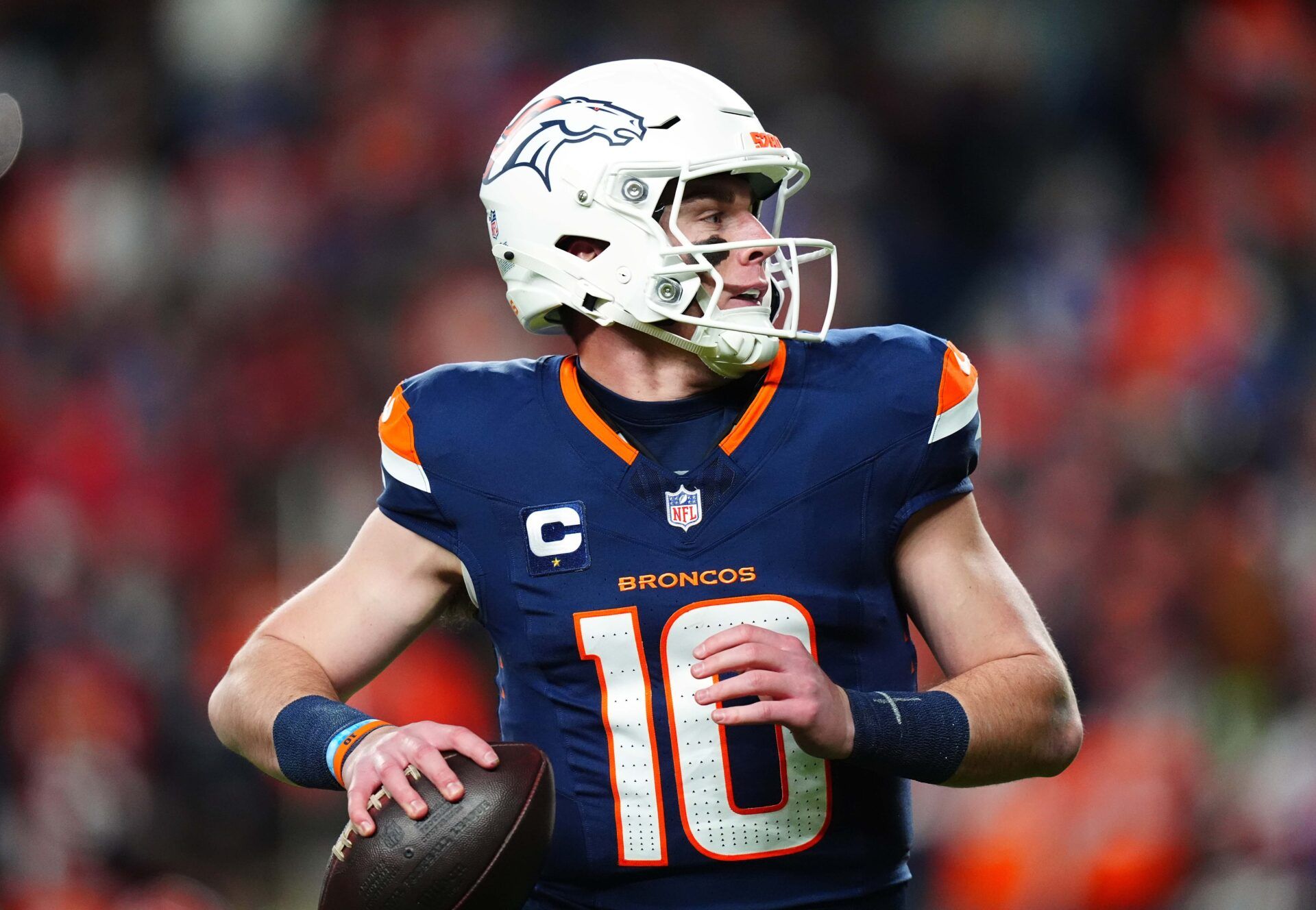 Dec 2, 2024; Denver, Colorado, USA; Denver Broncos quarterback Bo Nix (10) prepares to pass the ball in the second quarter against the Cleveland Browns at Empower Field at Mile High. Mandatory Credit: Ron Chenoy-Imagn Images