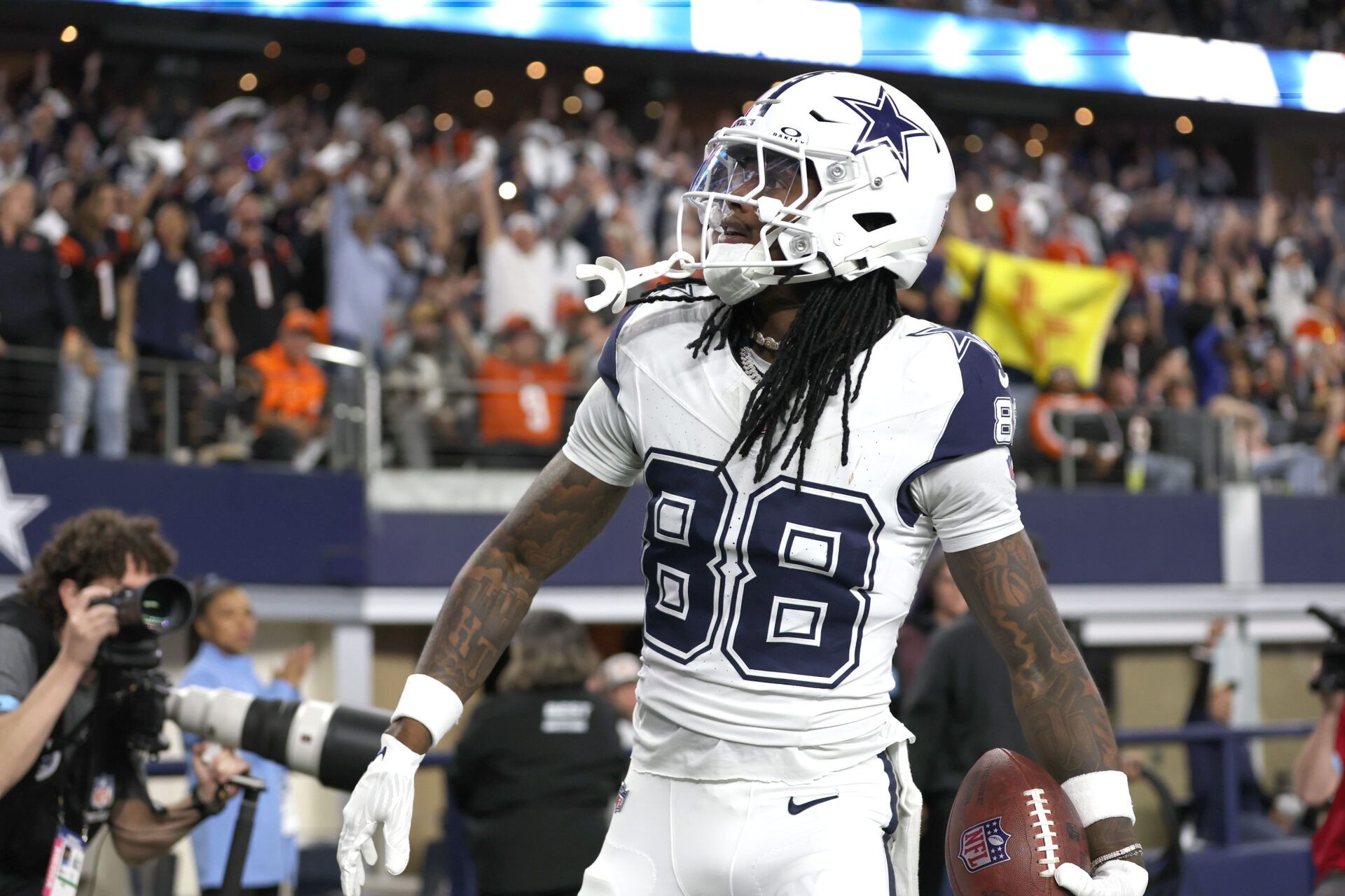 Dec 9, 2024; Arlington, Texas, USA; Dallas Cowboys wide receiver CeeDee Lamb (88) reacts after scoring a touchdown against the Cincinnati Bengals in the first quarter at AT&T Stadium. Mandatory Credit: Tim Heitman-Imagn Images