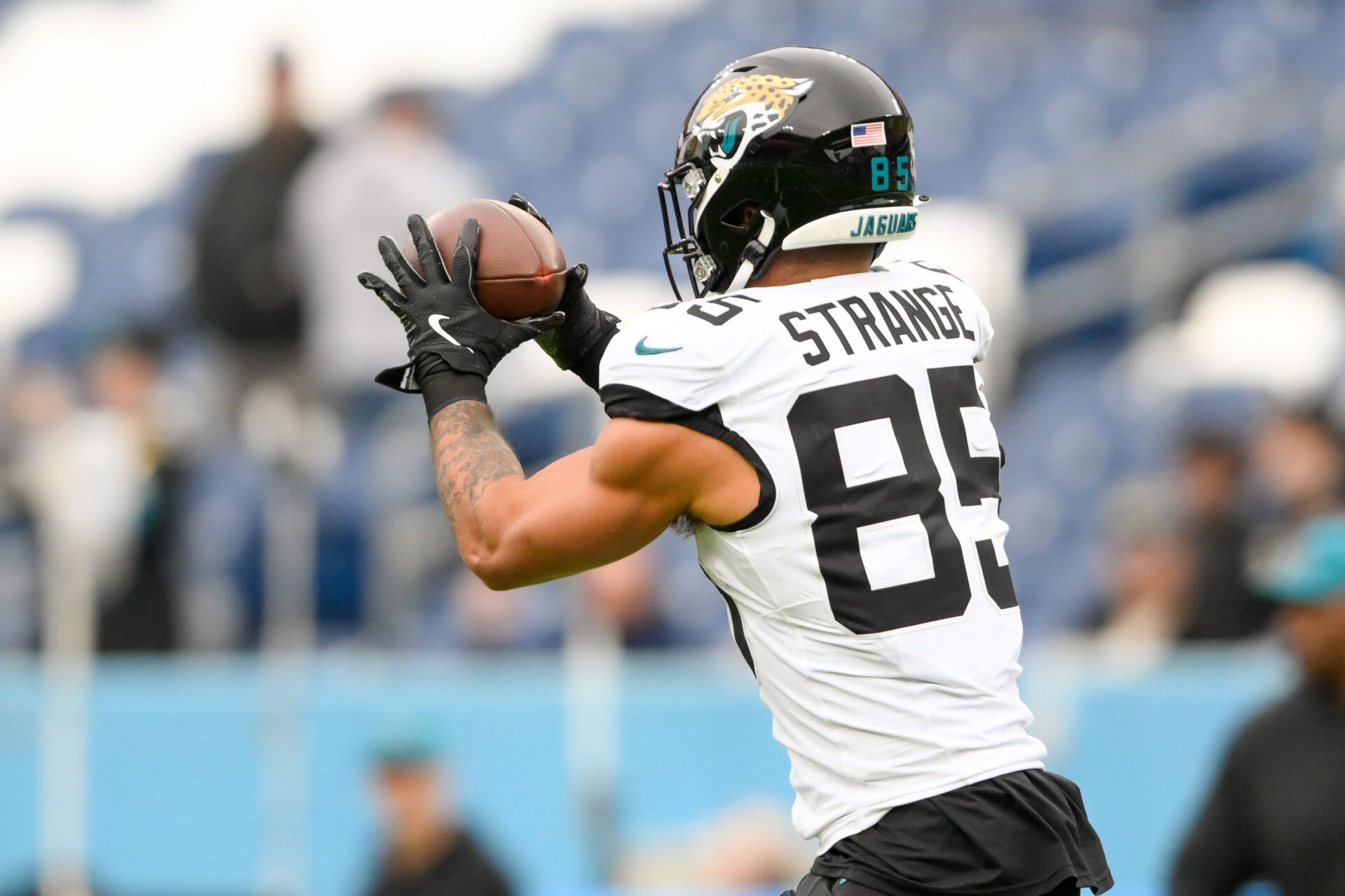 Dec 8, 2024; Nashville, Tennessee, USA; Jacksonville Jaguars tight end Brenton Strange (85) makes a catch during pregame warmups against the Tennessee Titans at Nissan Stadium. Mandatory Credit: Steve Roberts-Imagn Images