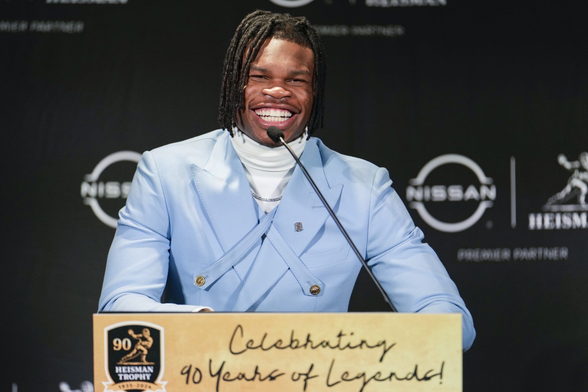 ‘She Need To Be on TV’ – Lil Wayne Praises Travis Hunter and His Mom for Their Speeches at Heisman Ceremony