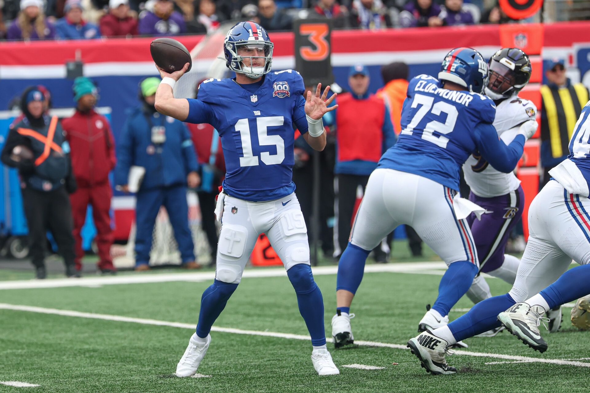 New York Giants quarterback Tommy DeVito (15) passes the ball during the first quarter against the Baltimore Ravens at MetLife Stadium.