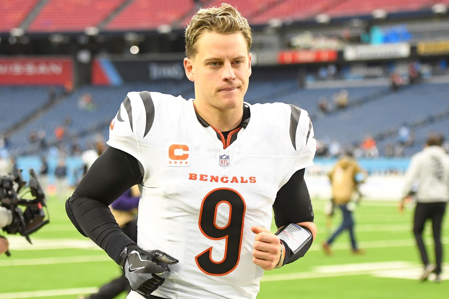 Cincinnati Bengals quarterback Joe Burrow (9) runs off the field against the Tennessee Titans during the second half at Nissan Stadium.