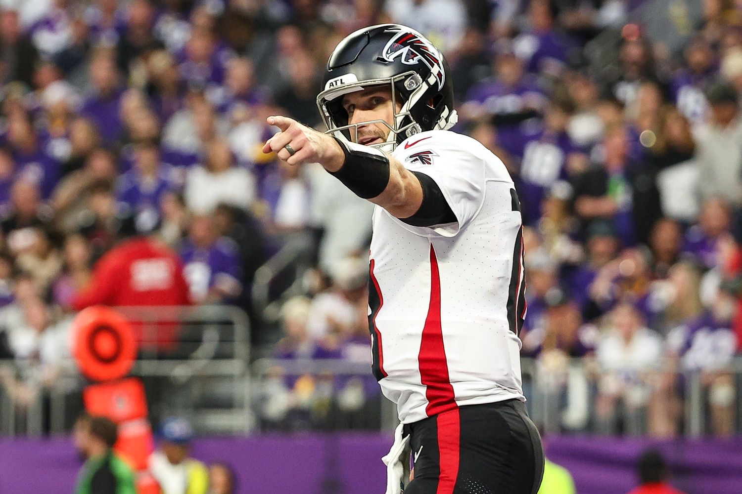 Atlanta Falcons quarterback Kirk Cousins (18) celebrates running back Bijan Robinson's (7) touchdown against the Minnesota Vikings during the third quarter at U.S. Bank Stadium.