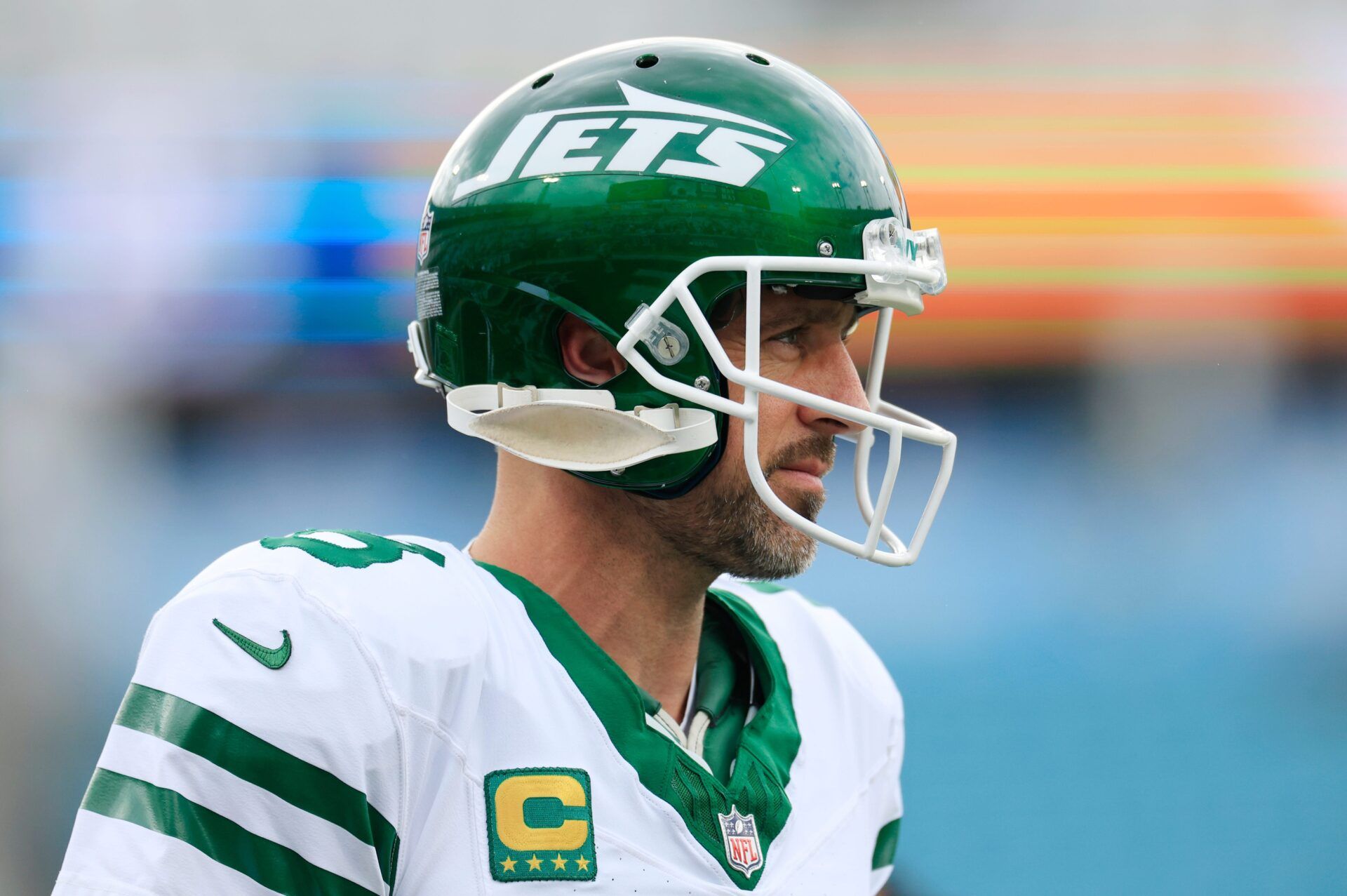 New York Jets quarterback Aaron Rodgers (8) looks on before an NFL football matchup Sunday, Dec. 15, 2024 at EverBank Stadium in Jacksonville, Fla.