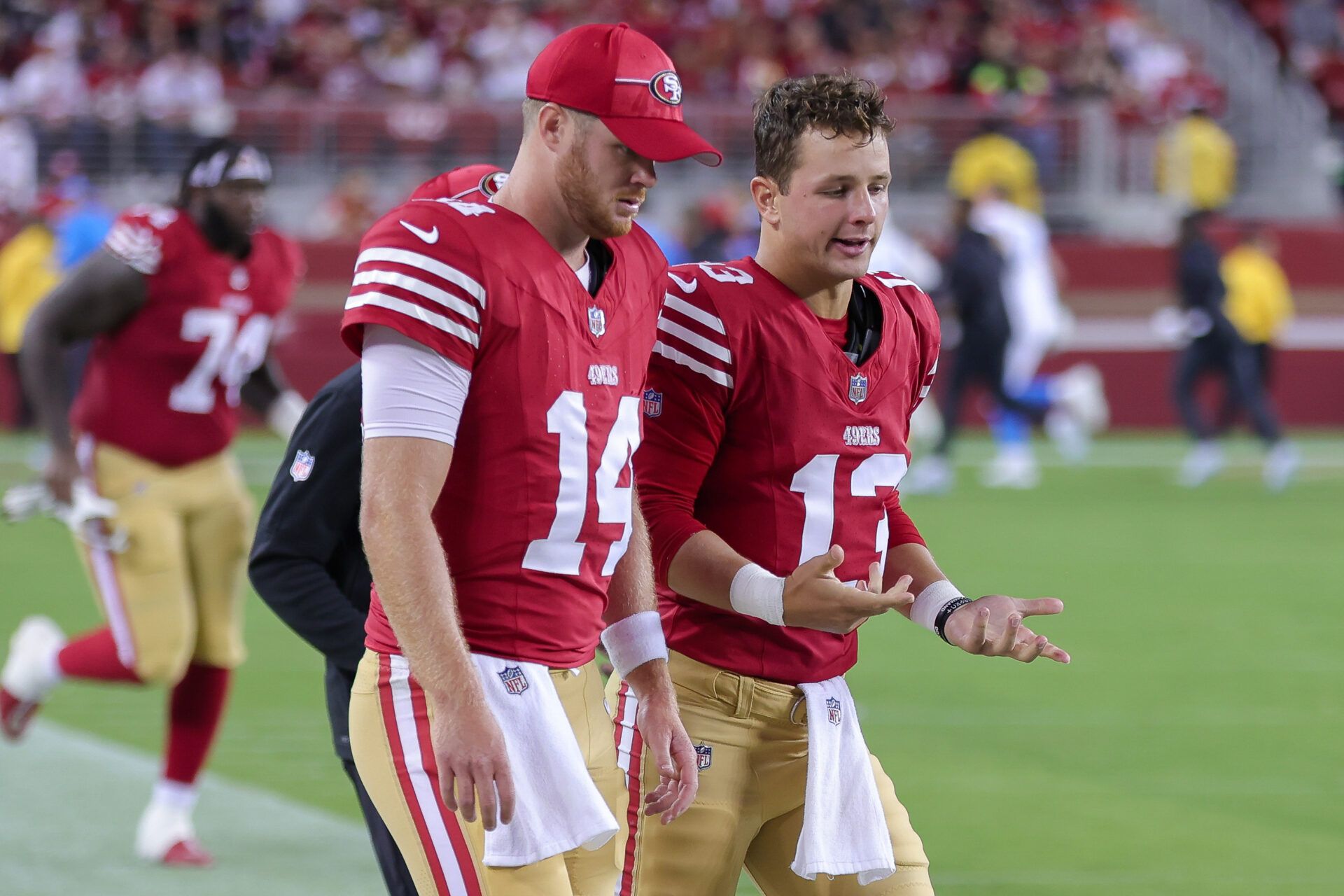 Aug 25, 2023; Santa Clara, California, USA; San Francisco 49ers quarterback Brock Purdy (13) and quarterback Sam Darnold (14) during the game against the Los Angeles Chargers at Levi's Stadium. Mandatory Credit: Sergio Estrada-USA TODAY Sports