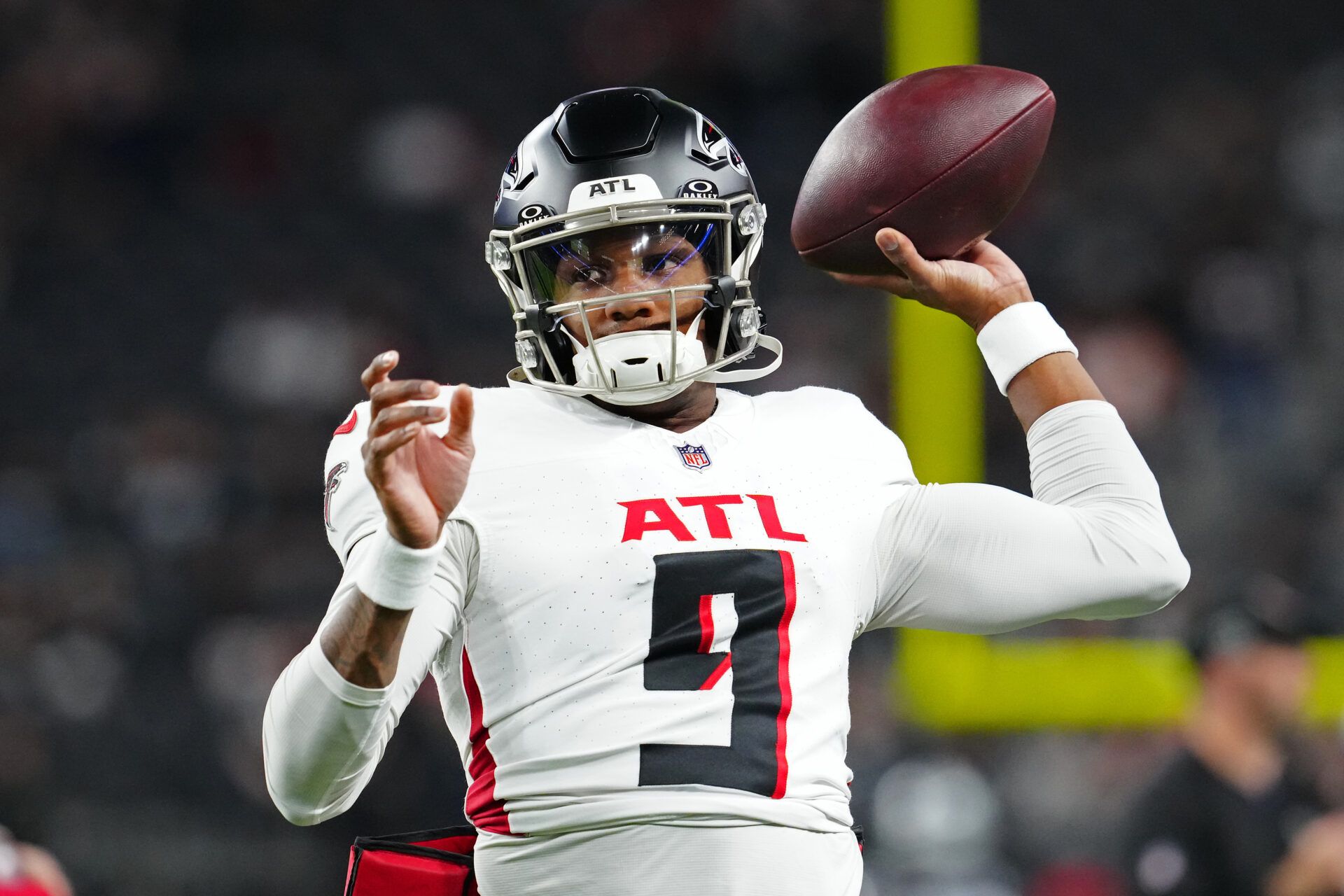 Dec 16, 2024; Paradise, Nevada, USA; Atlanta Falcons quarterback Michael Penix Jr. (9) warms up before a game against the Las Vegas Raiders at Allegiant Stadium. Mandatory Credit: Stephen R. Sylvanie-Imagn Images