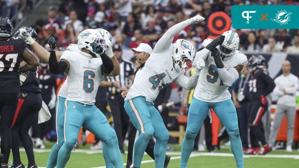 Miami Dolphins linebacker Chop Robinson (44) celebrates with teammates after a defensive play during the third quarter against the Houston Texans at NRG Stadium.